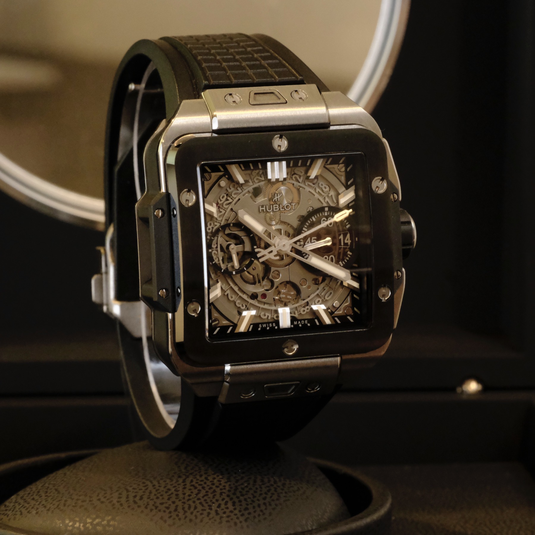 May be an image of wrist watch and text that says 'دس LON HUBLOT HUB C'