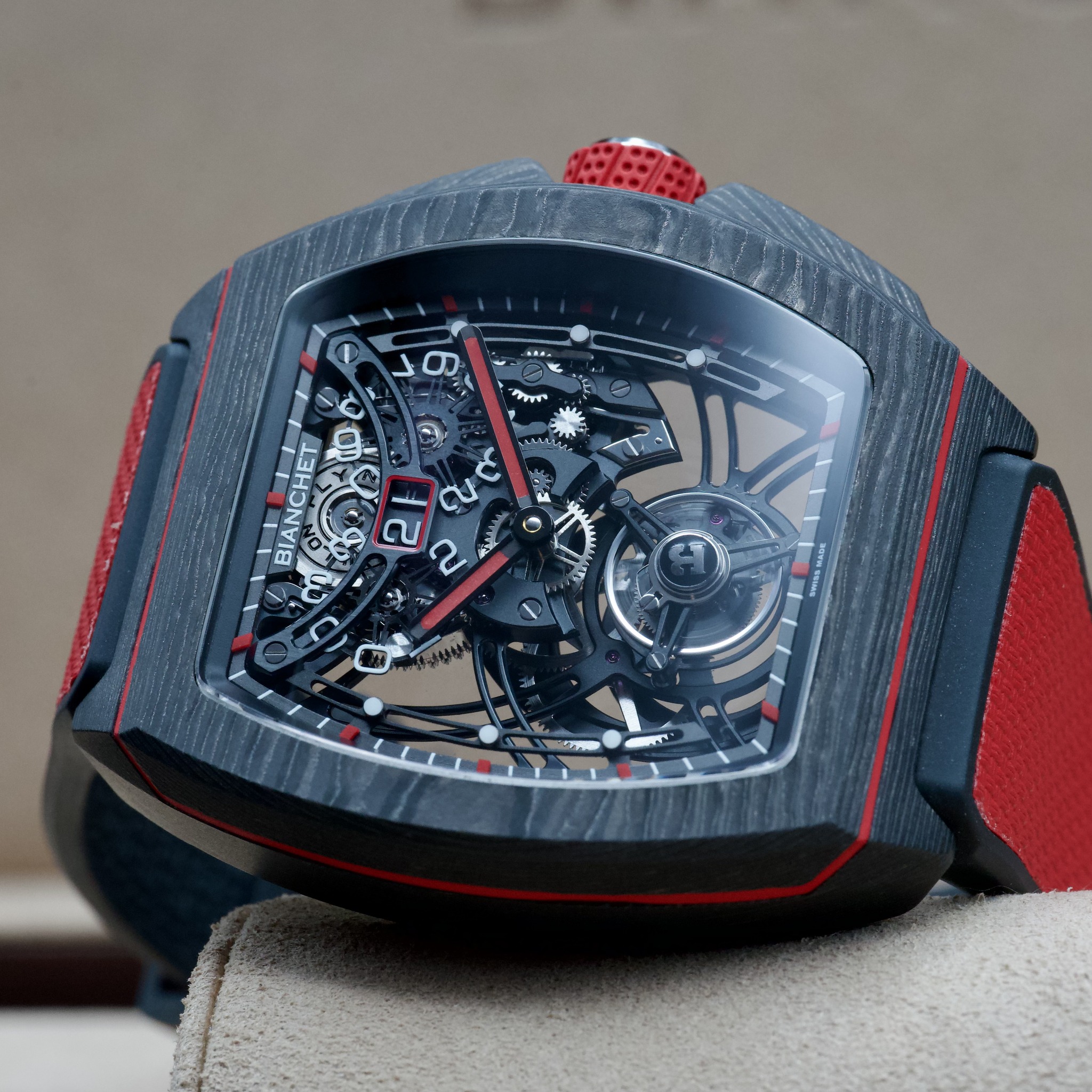 May be an image of wrist watch and text