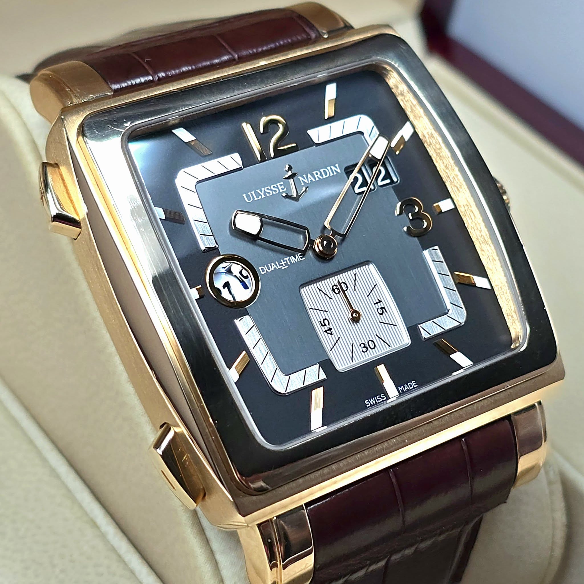 May be an image of wrist watch and text