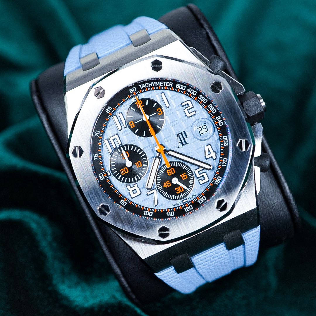 May be an image of wrist watch and text