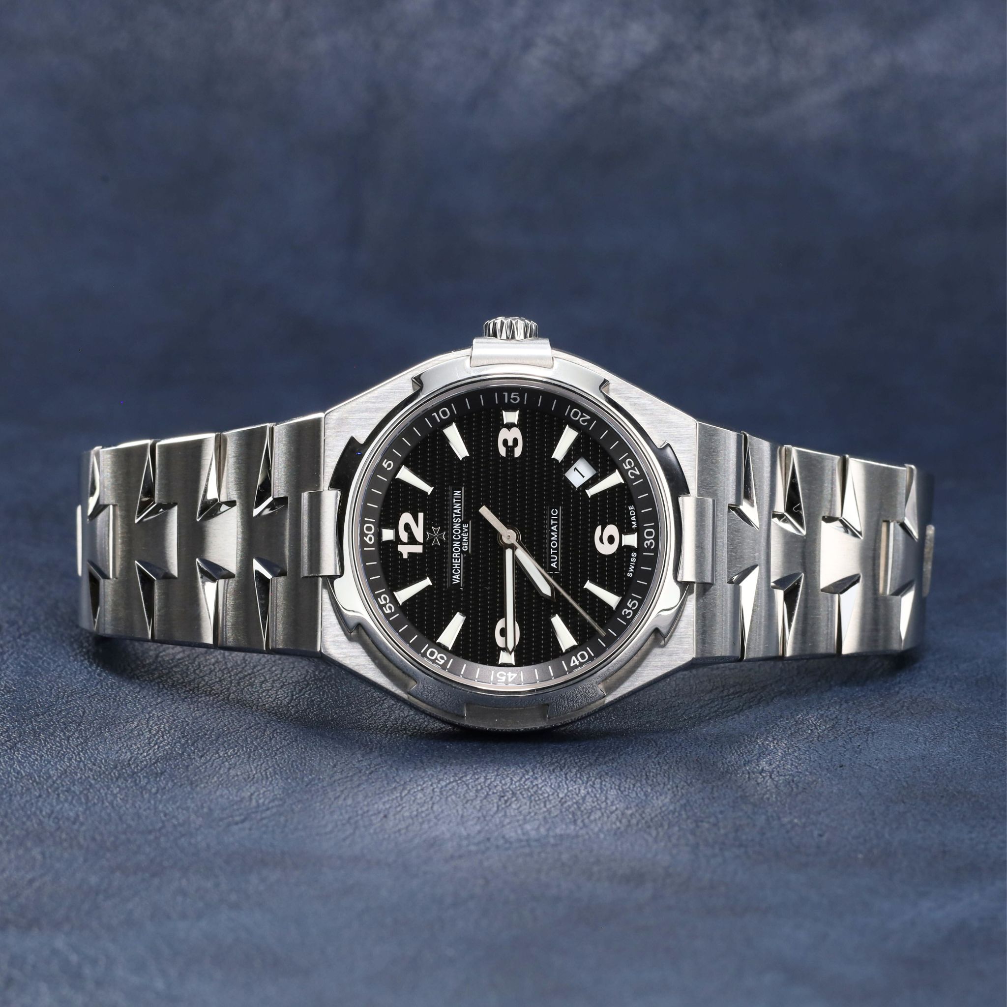 May be an image of wrist watch and text