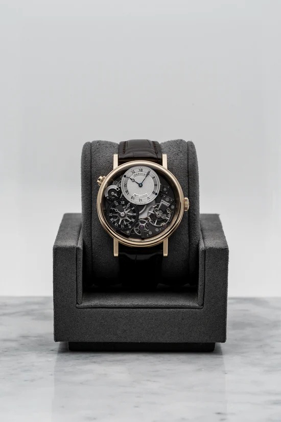 May be an image of jewellery, wrist watch and text