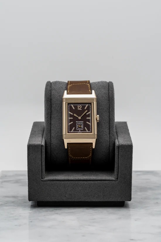 May be an image of leather, digital watch and text