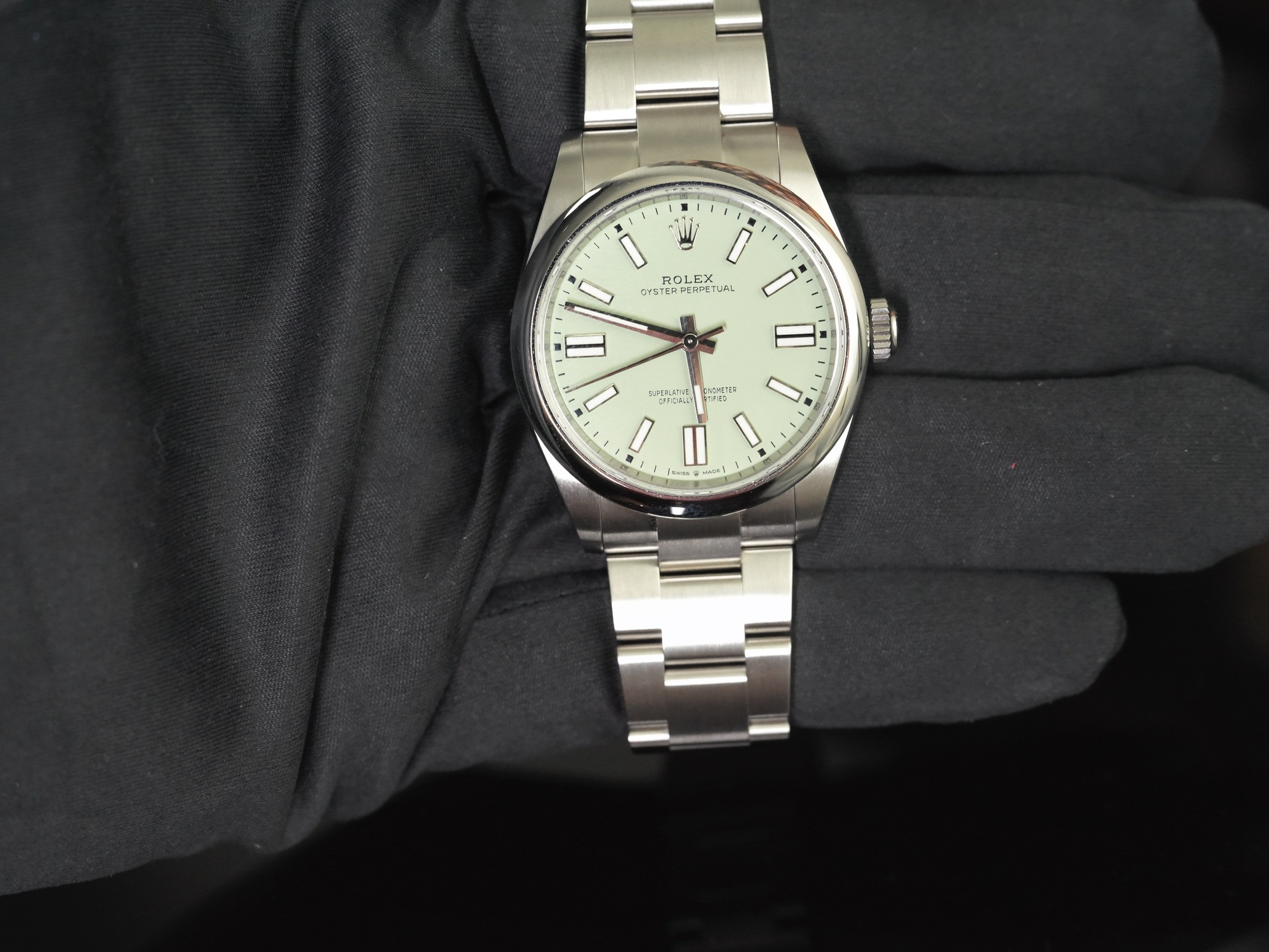 May be an image of wrist watch and text
