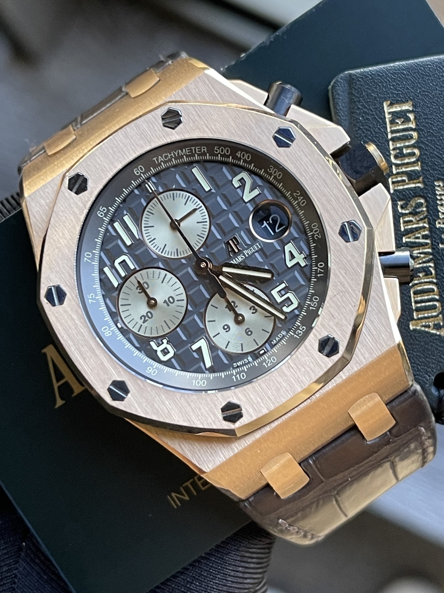 May be an image of wrist watch and text