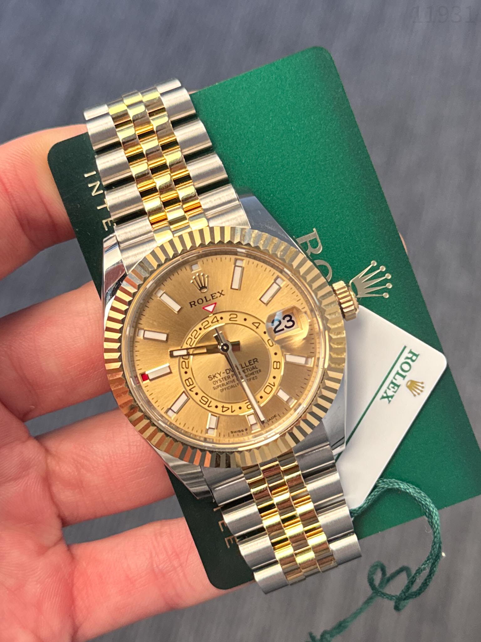May be an image of wrist watch and text