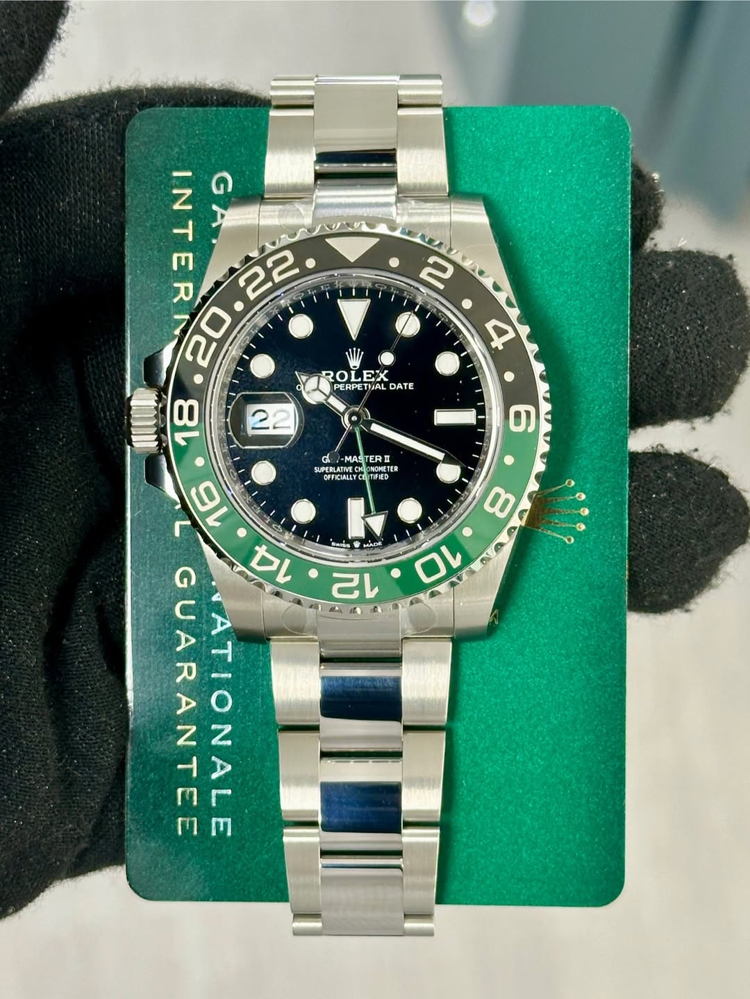 May be an image of wrist watch and text that says '12 INTERM GA G RO ROLE EX EX PERPETUAL DATE G MASTER TERI ERD UPERLATIVE OICILY আমহক R عمشر 6 っが GUARANTEE ATIONALE 14'