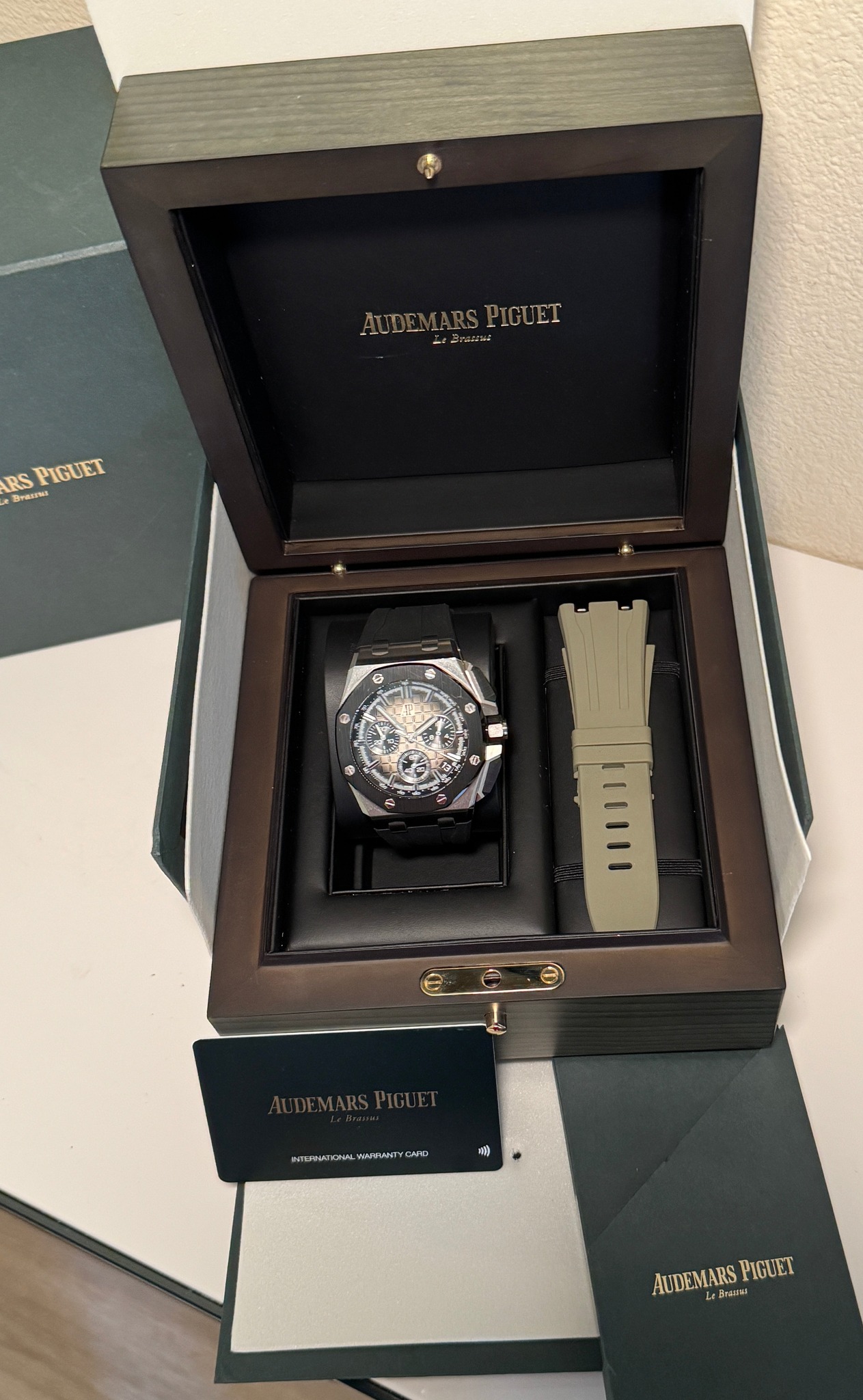 May be an image of wrist watch and text