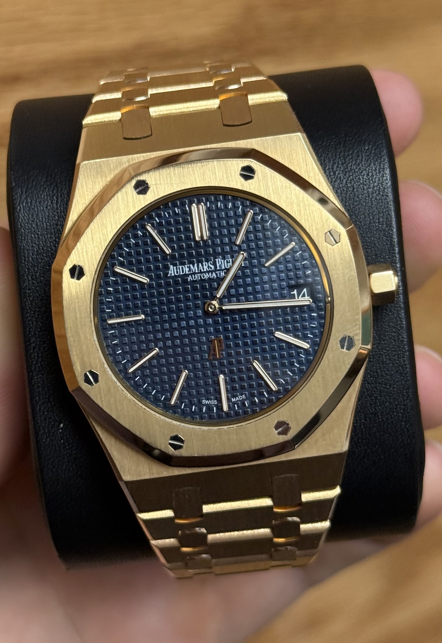 May be an image of wrist watch and text
