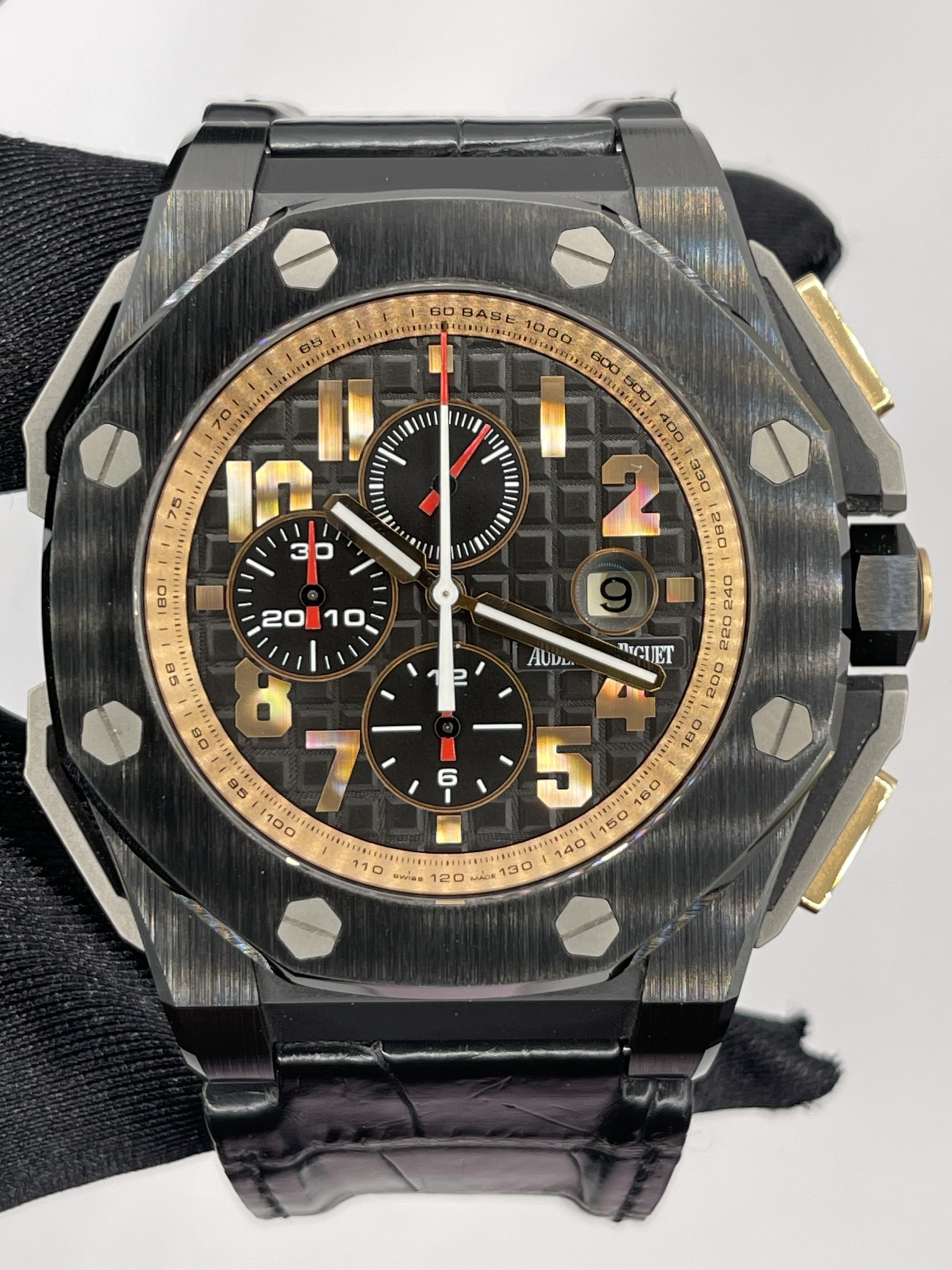 May be an image of wrist watch and text