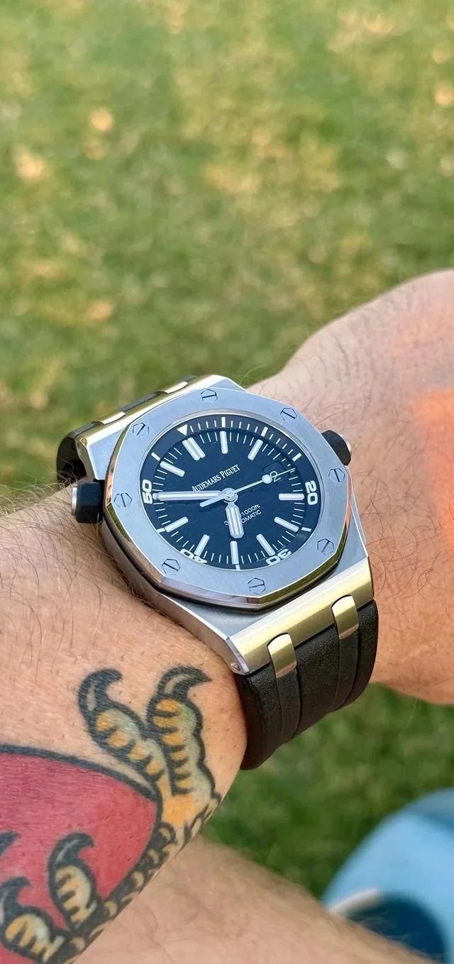 May be an image of wrist watch and text