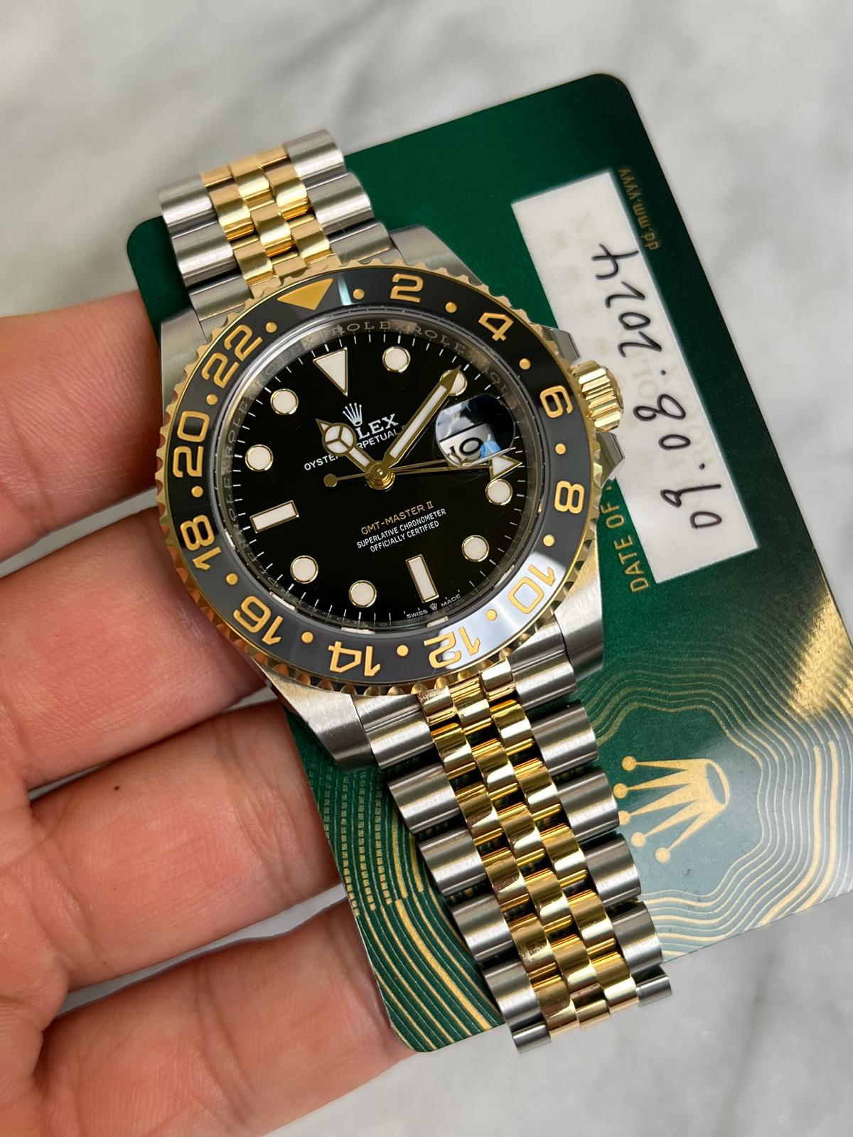 May be an image of wrist watch and text