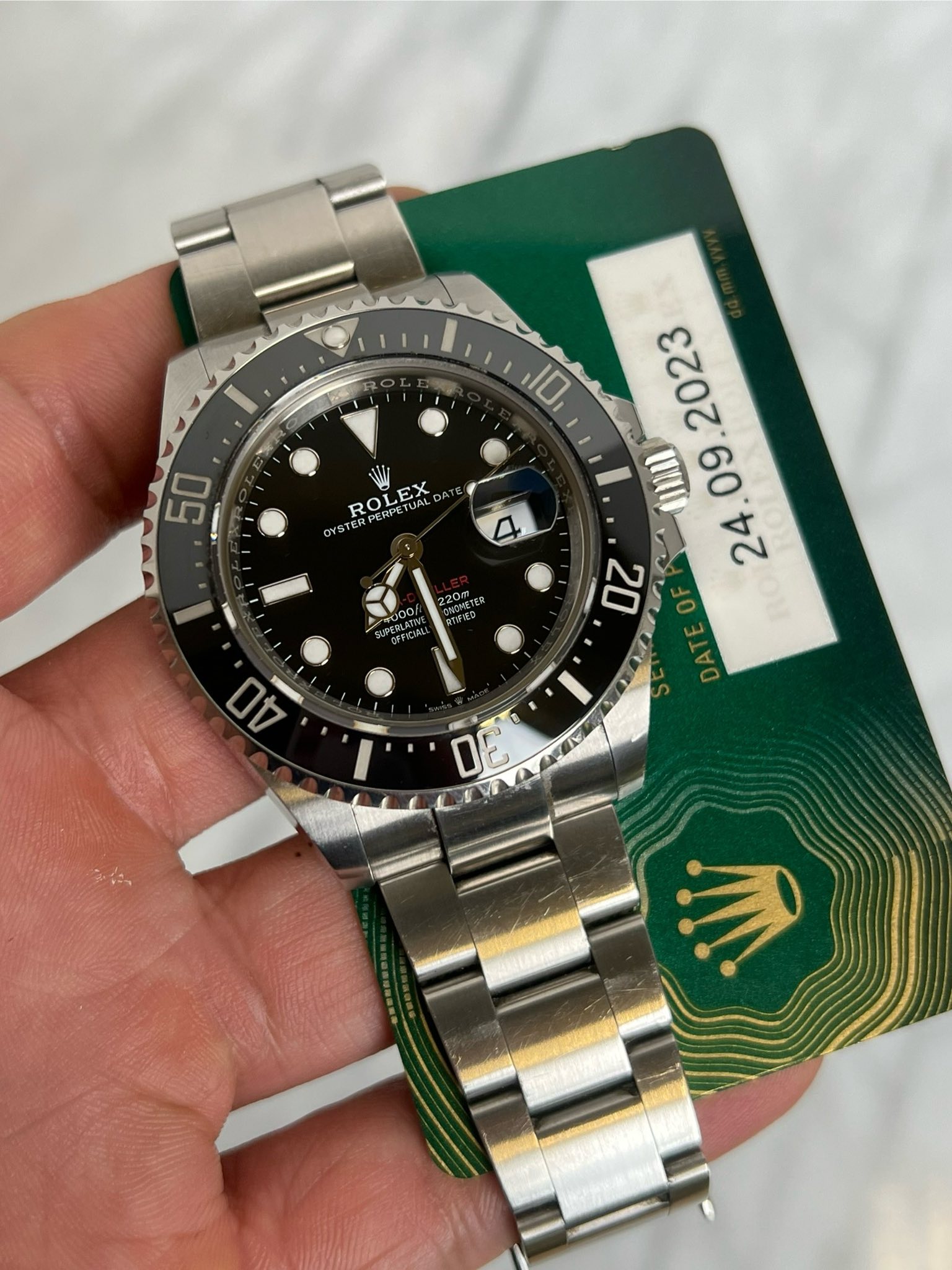 May be an image of wrist watch and text that says 'ROLEX ROLE LEX YSTER R RPERPETUAL DA DAT OF 20m AOETED WEGD eOD 000/ CECTИA ረሞ 3'