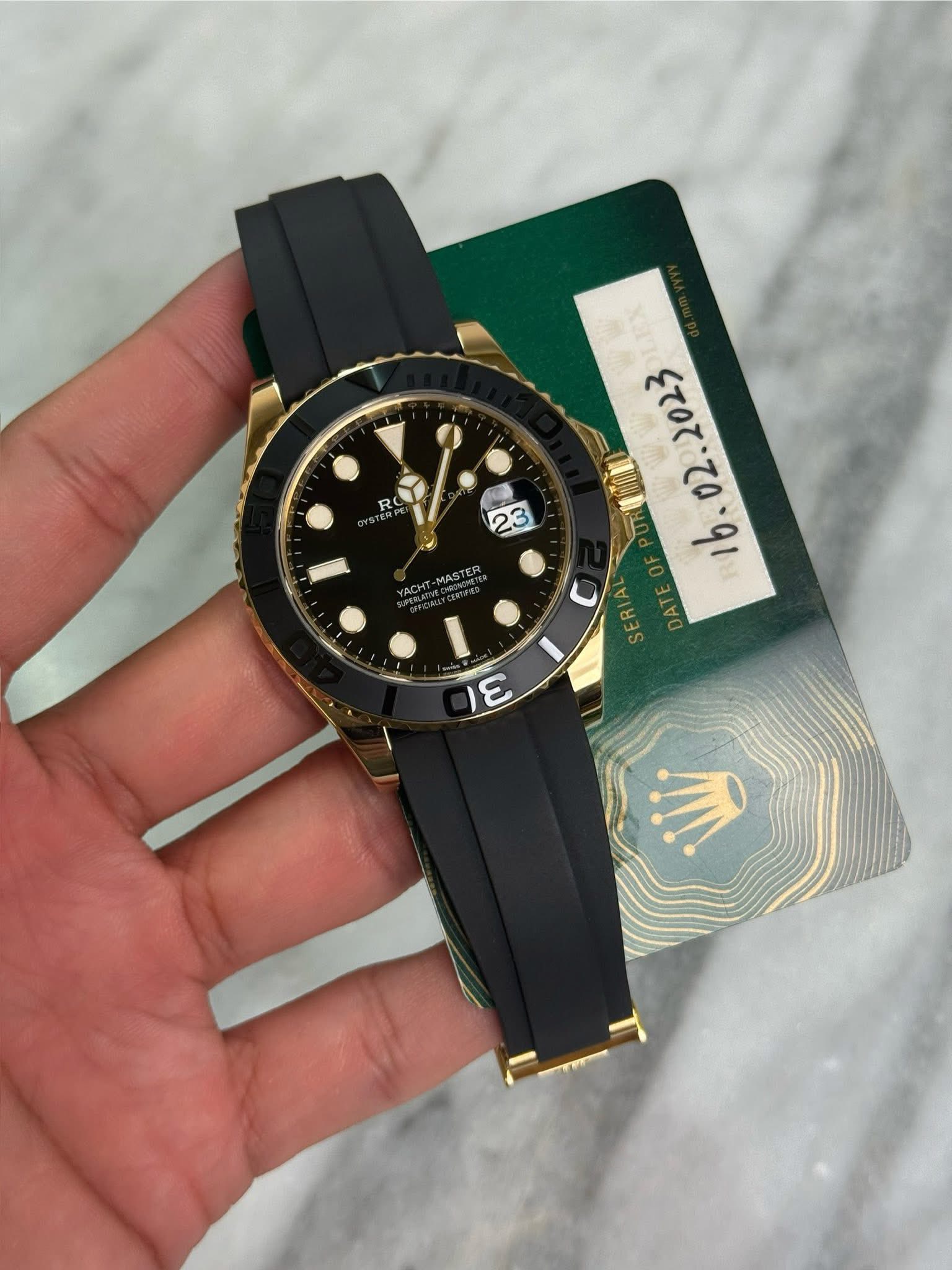 May be an image of wrist watch and text