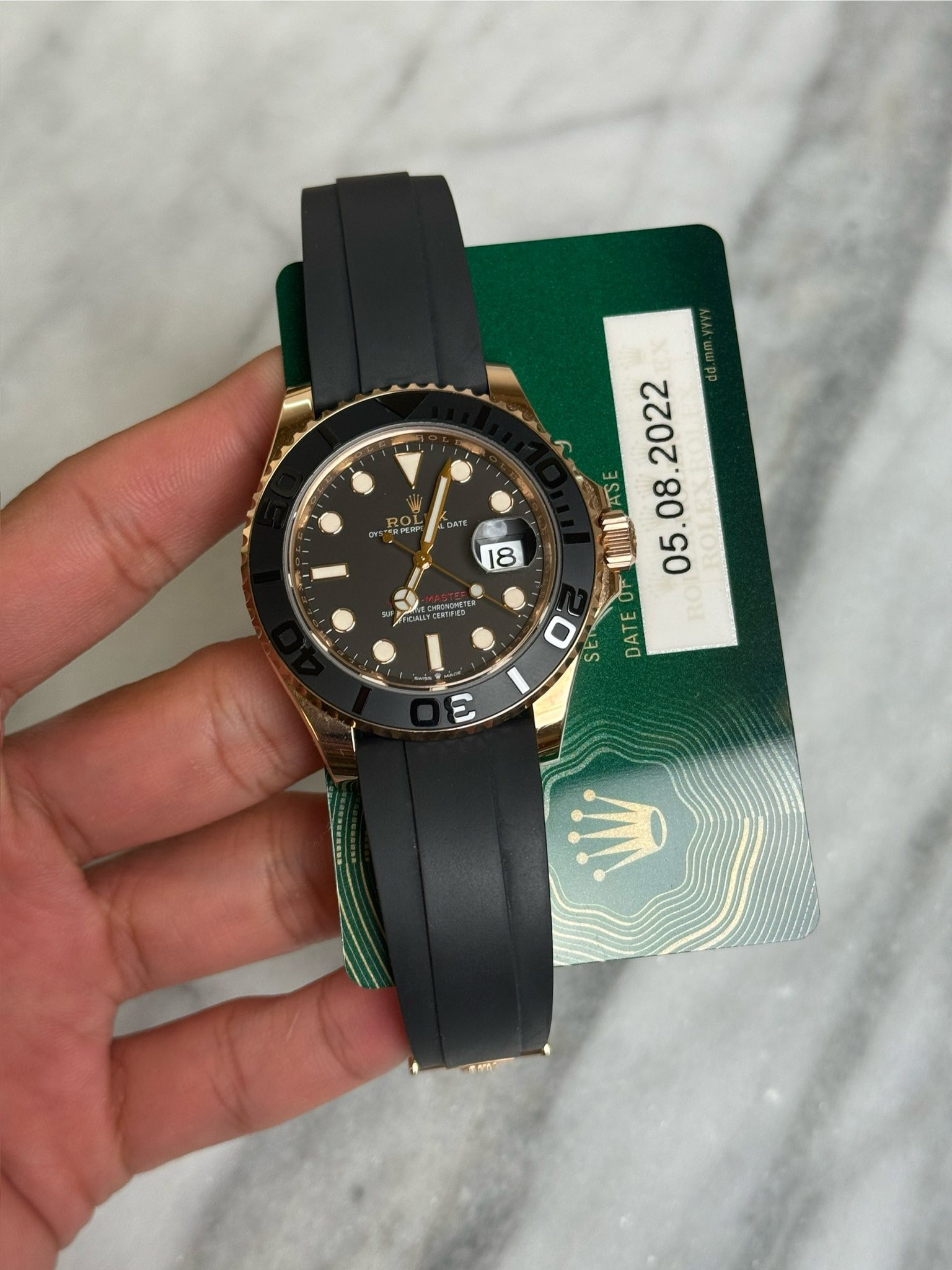 May be an image of wrist watch and text