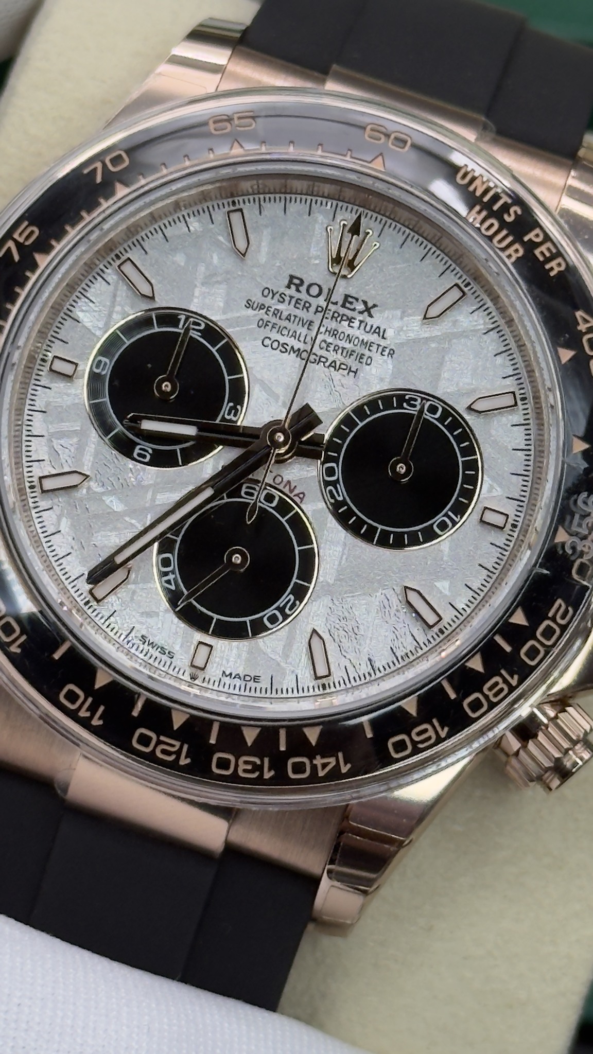 May be an image of wrist watch and text