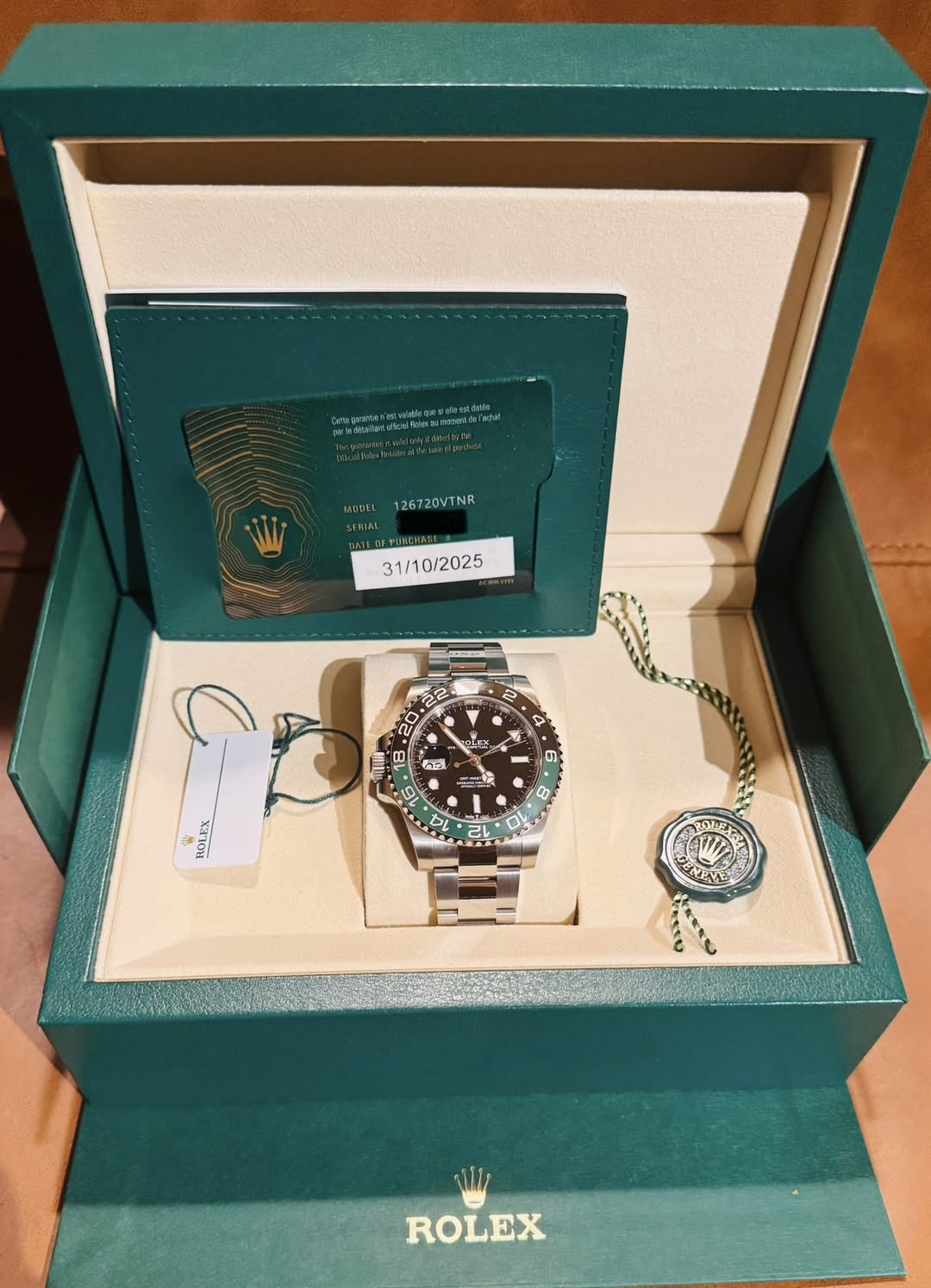 May be an image of wrist watch and text