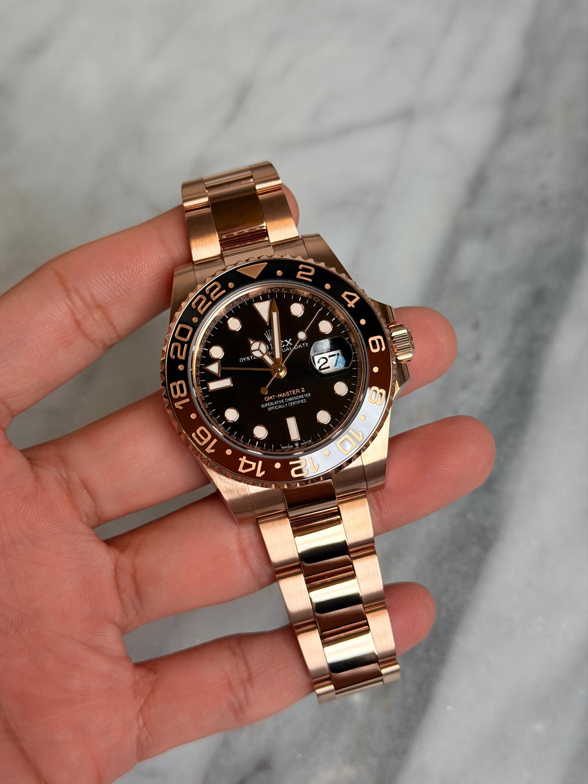 May be an image of wrist watch and text