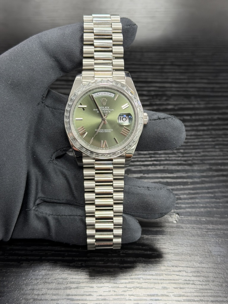 May be an image of wrist watch and text