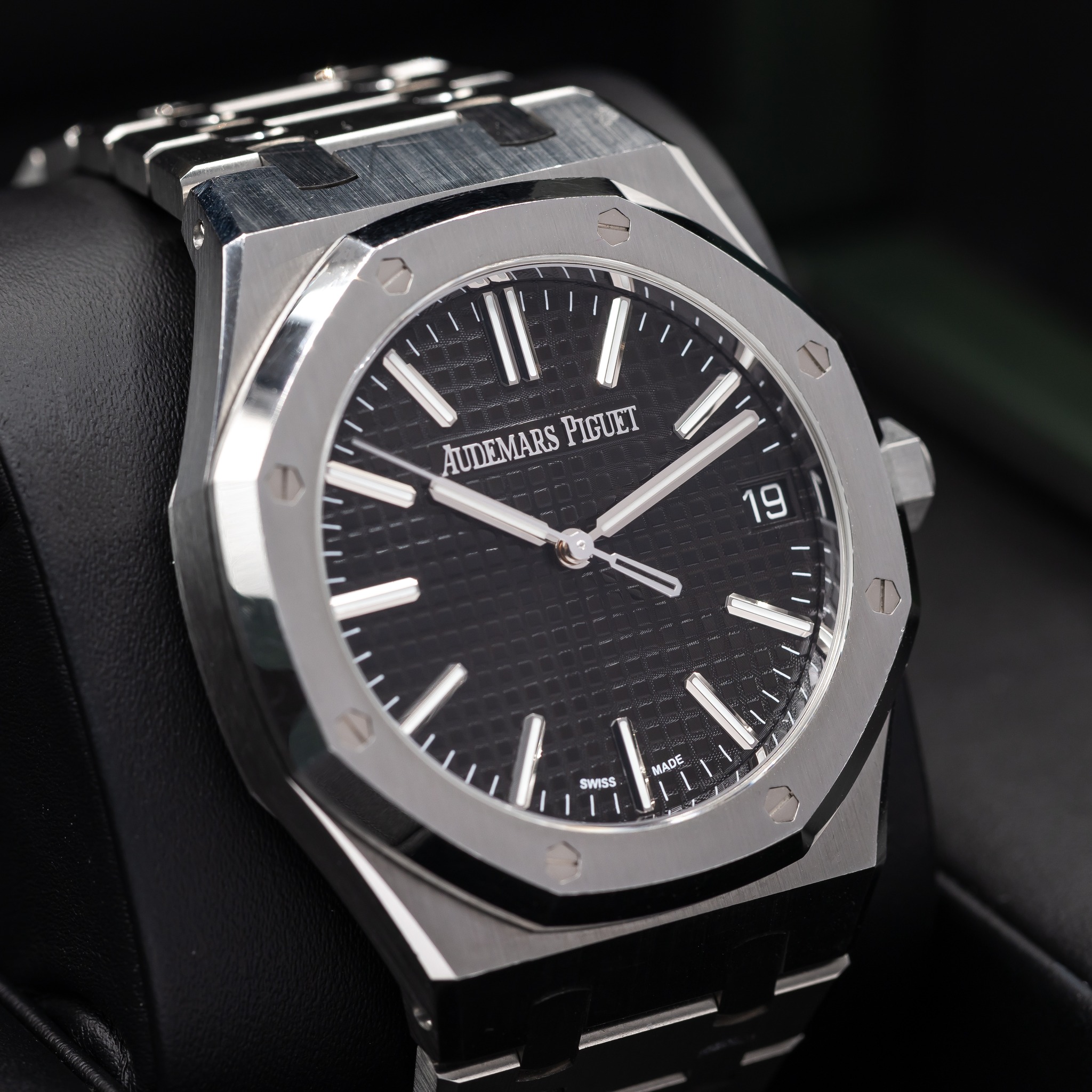 May be an image of wrist watch and text