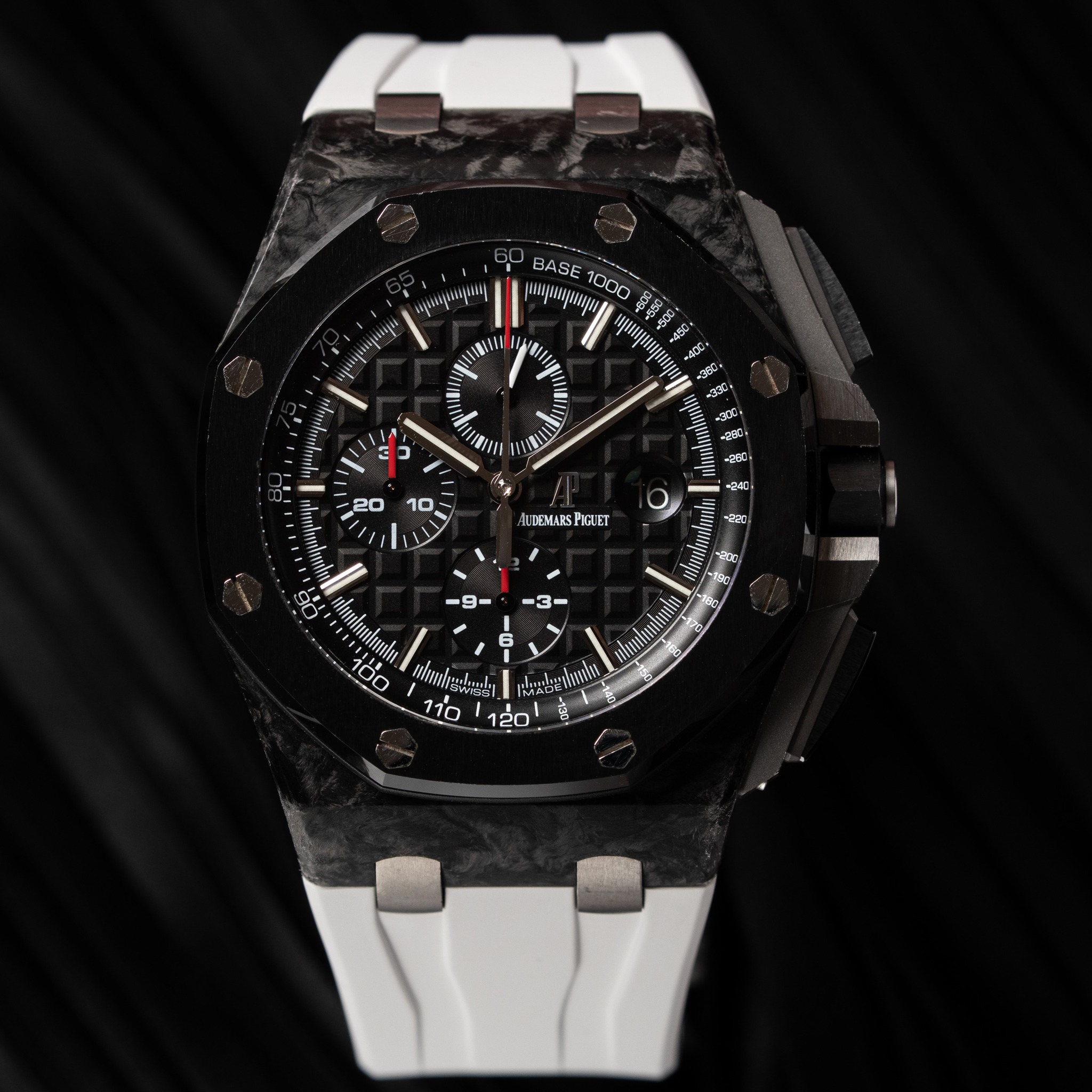 May be an image of wrist watch and text