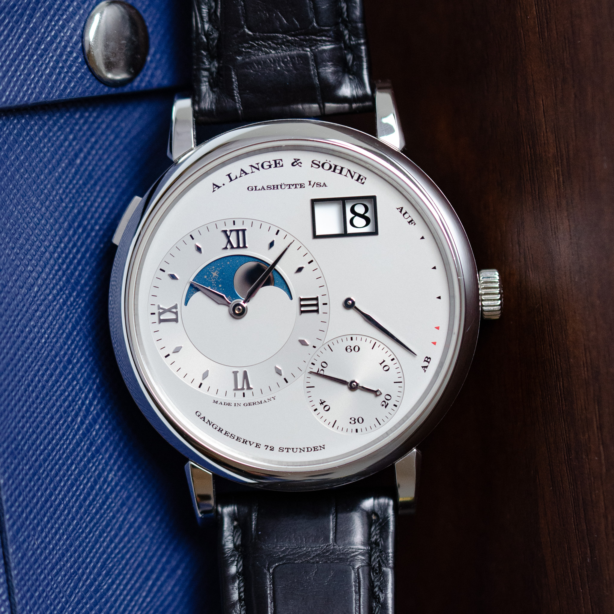 May be an image of wrist watch and text that says 'LANGE & SOHNE /EA A. GLASHUTTE EBA XII AUP IX II 60 30 lo ብ LB IA MAnCIs UERdANY GANCRYSERVE 75 호 0 *0 / :30'