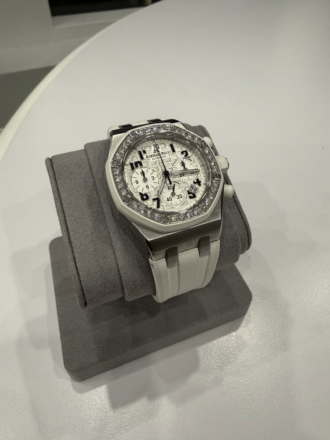 May be an image of wrist watch and text