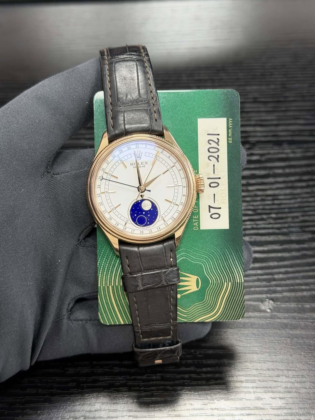May be an image of wrist watch and text