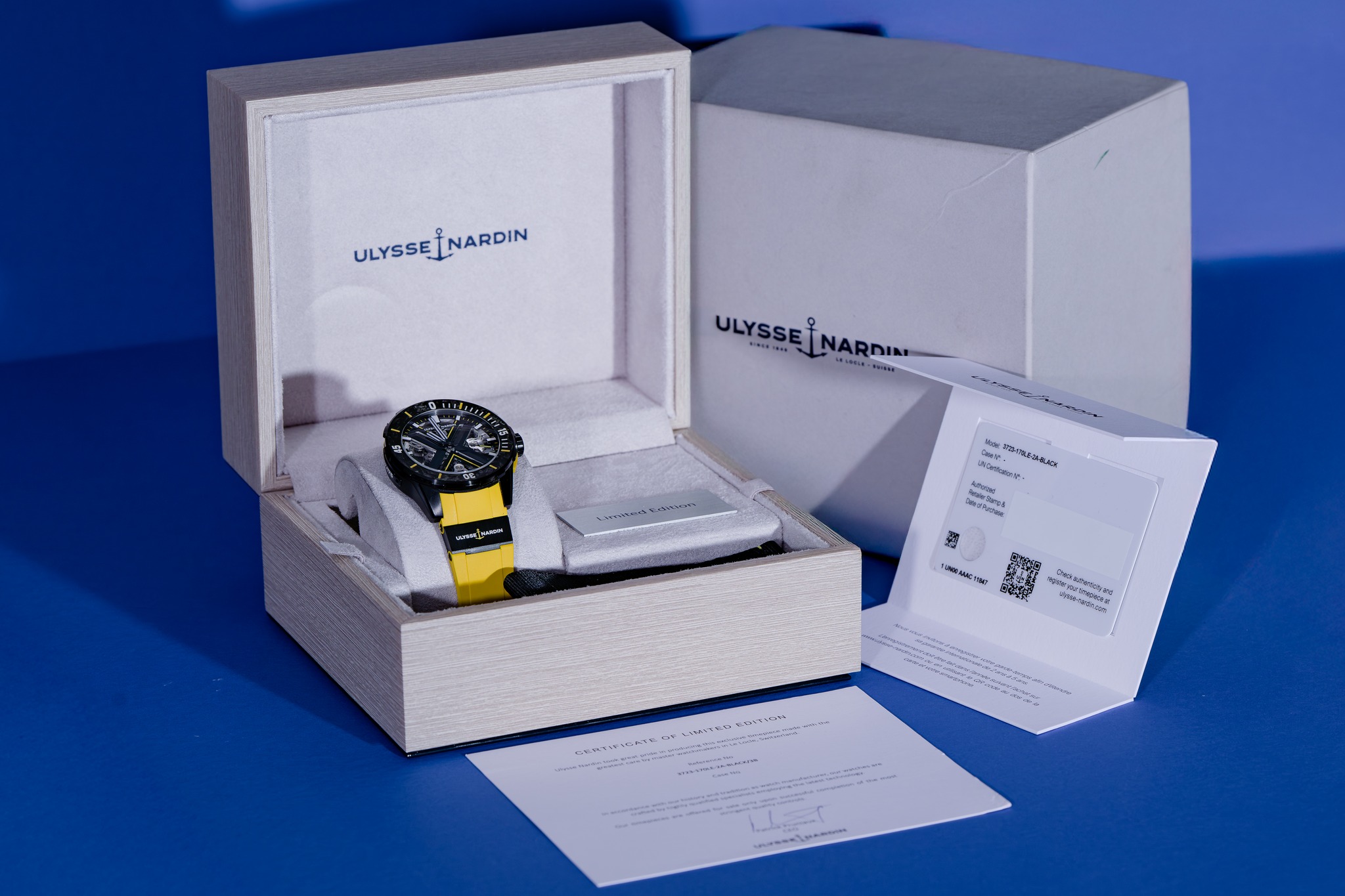 May be an image of cufflinks, wrist watch, matchbook and text