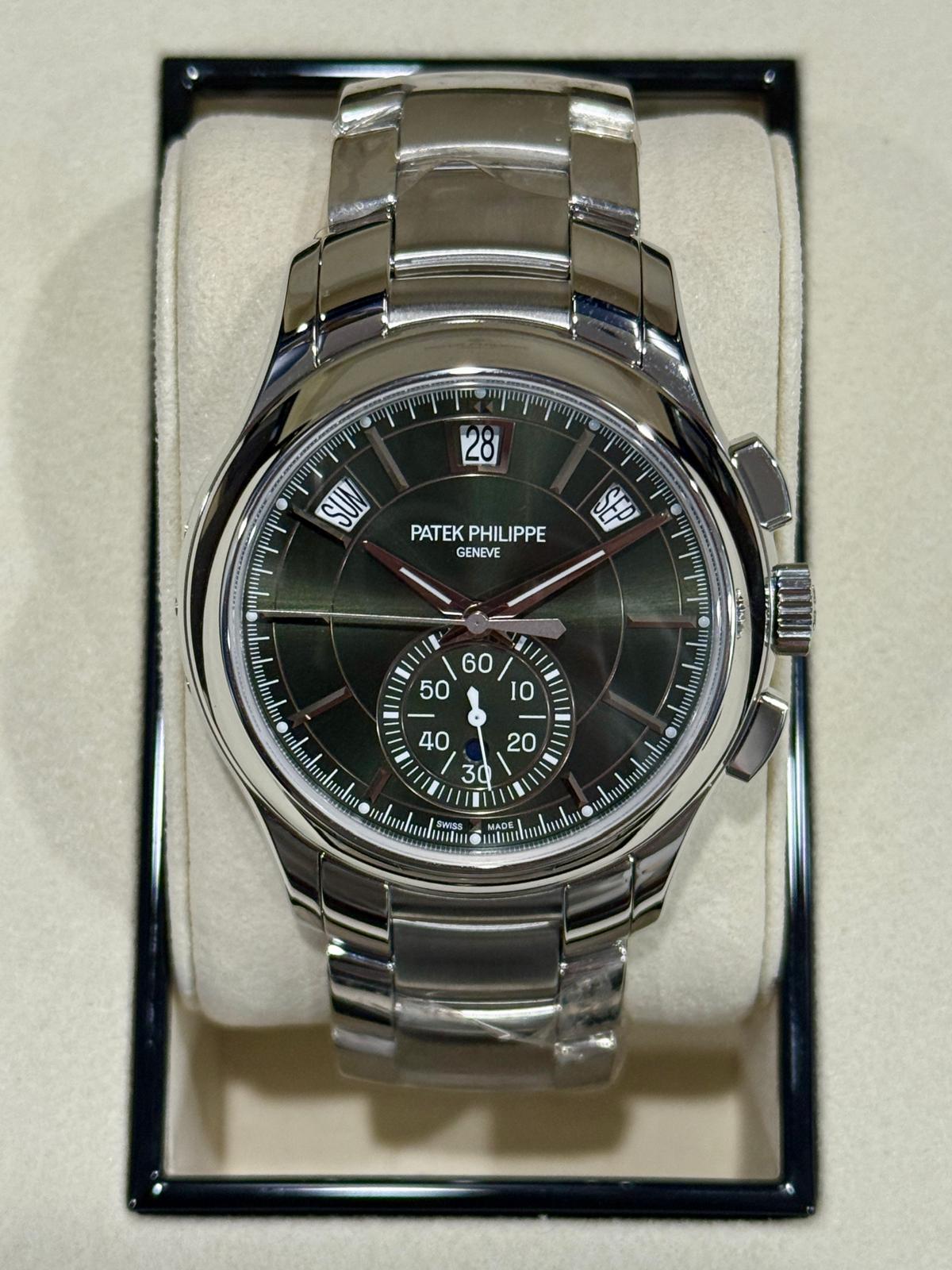 May be an image of wrist watch and text that says 'PATEK PATEKPHILIPPE PHILIPPE GENEVE SEP ייויייץי lnlualu 40 30 20 lu lswas MADE'