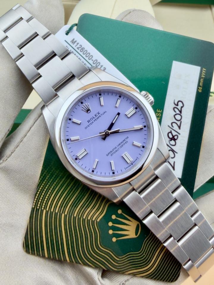 May be an image of wrist watch and text that says 'M126000-0013 msI N a 注製は 注11 2 S 4 ROLEX Ch TUAL PERPE PERS OYST OYSTERE ΑΛΛл 1L "WW do S 20/08/2025 CHRONONETER ER CERTIIES…