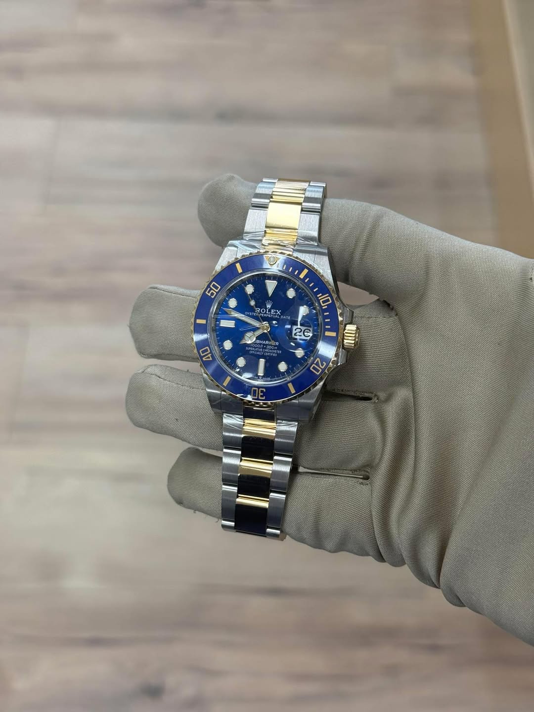 May be an image of wrist watch and text