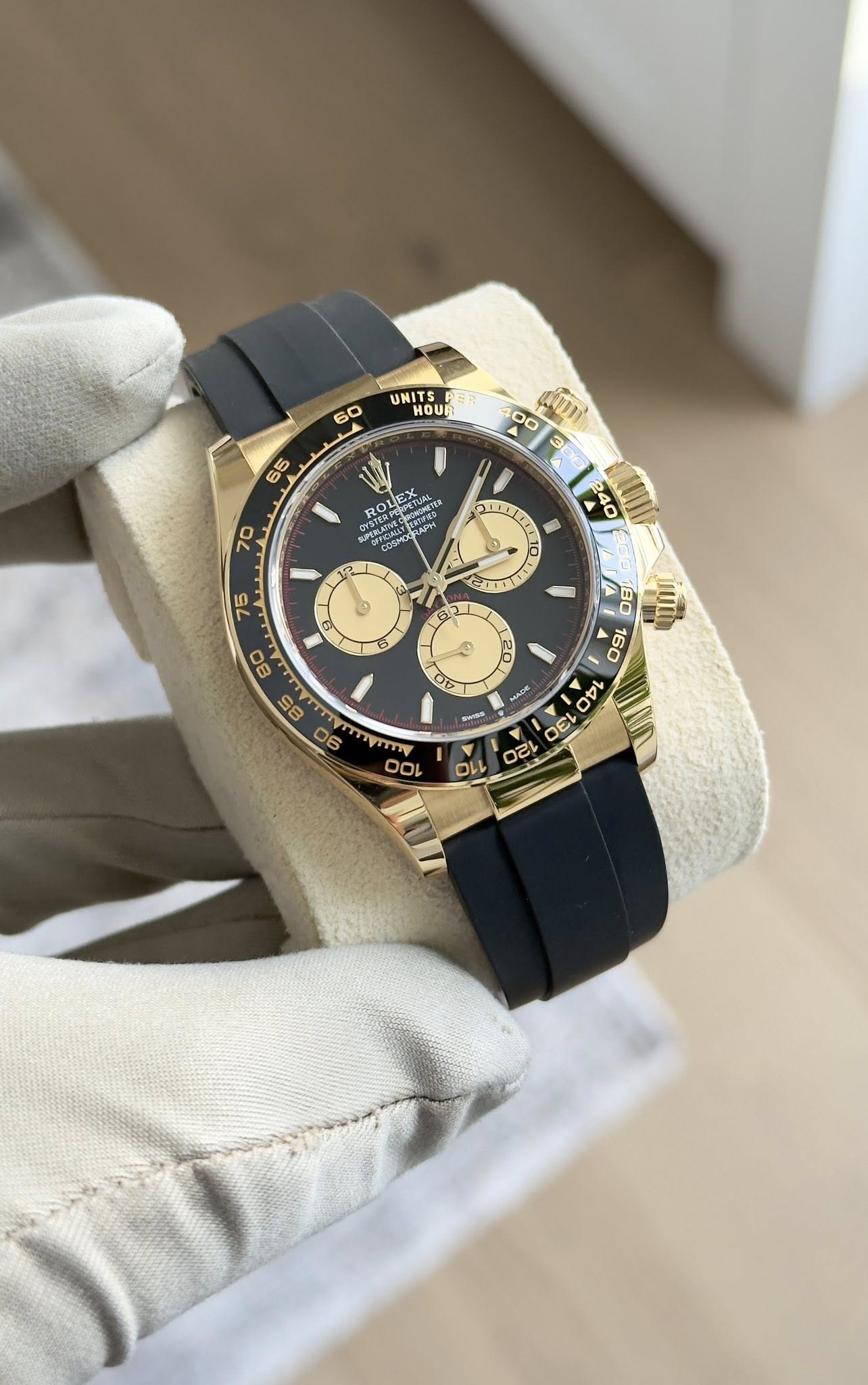 May be an image of wrist watch and text