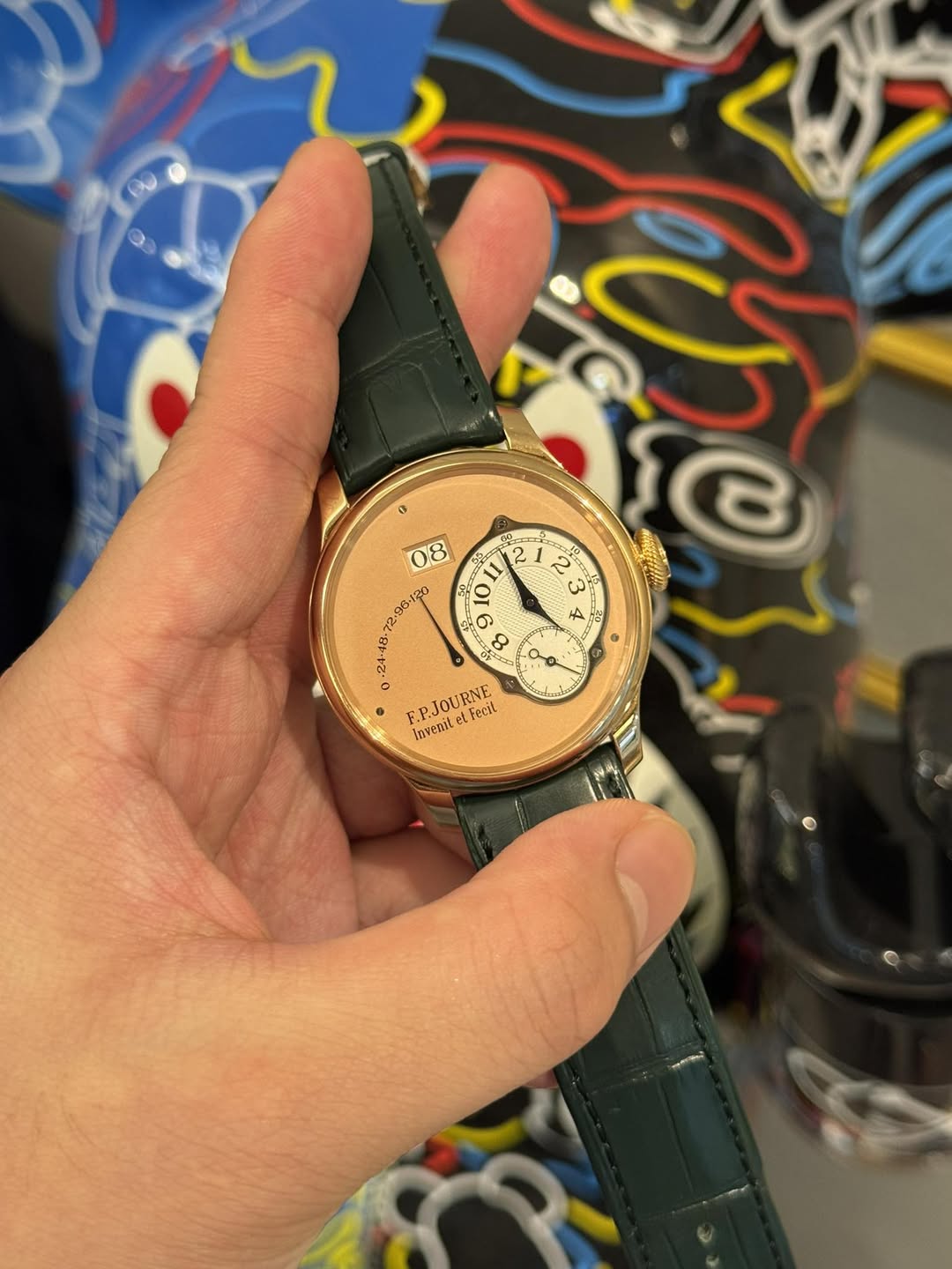 May be an image of wrist watch and text