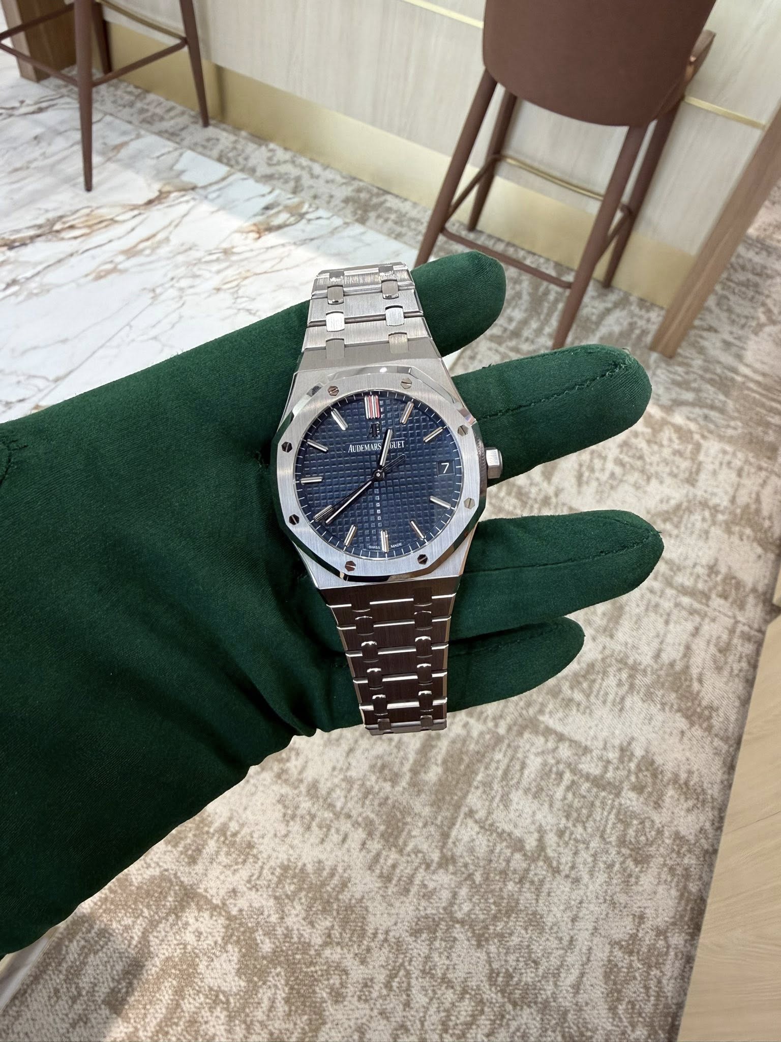 May be an image of wrist watch and text