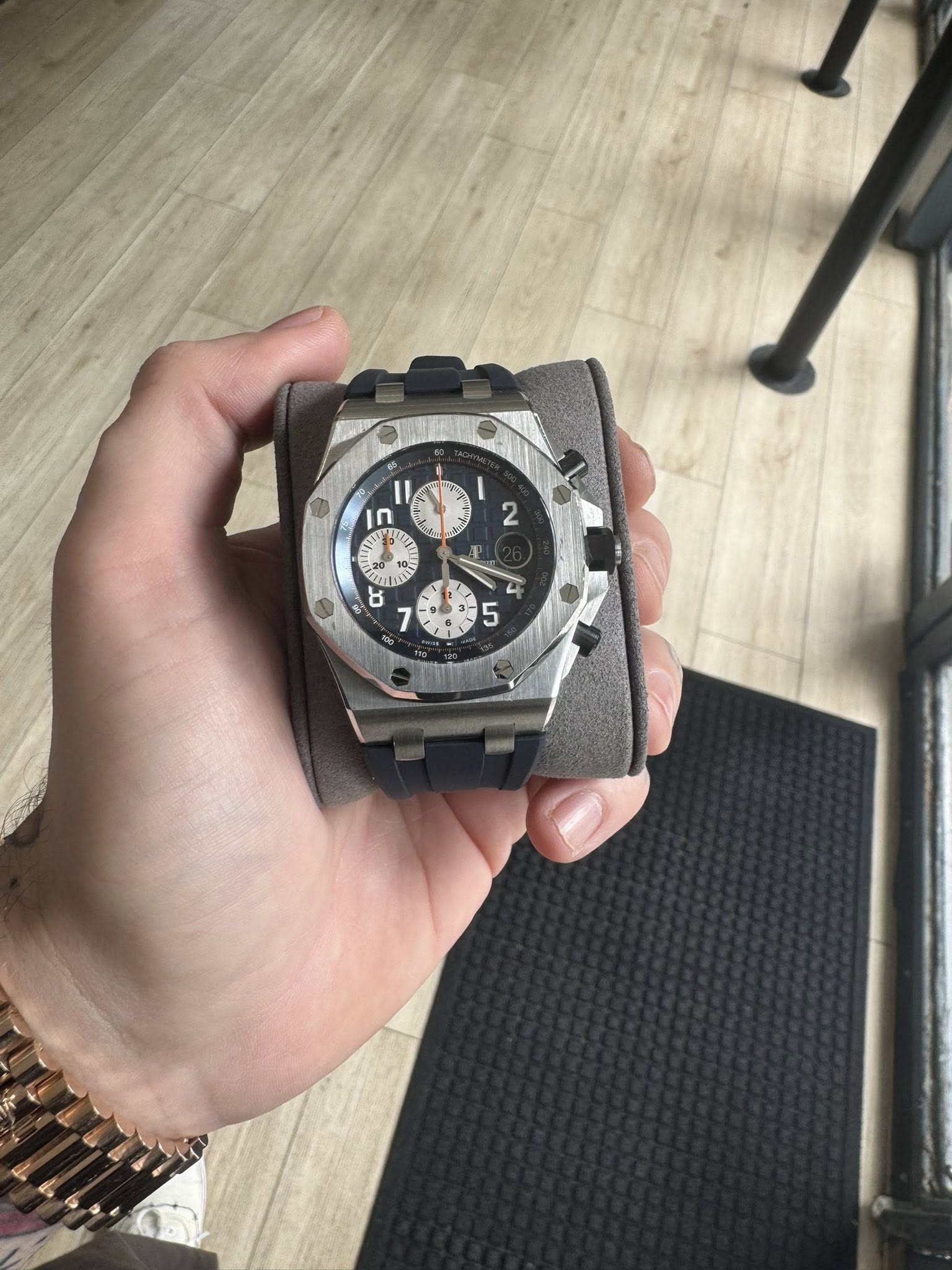 May be an image of wrist watch and text
