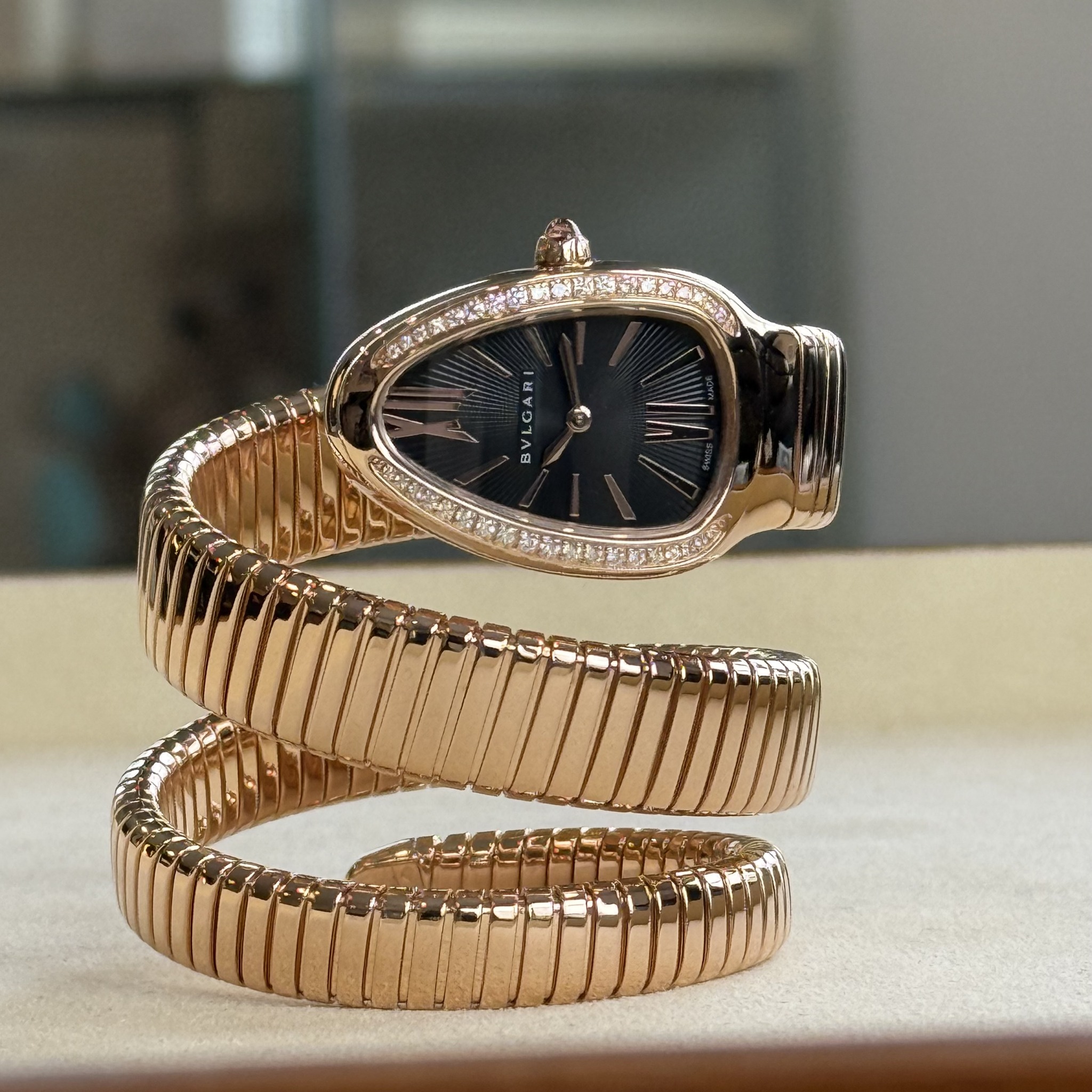 May be an image of wrist watch and jewelry