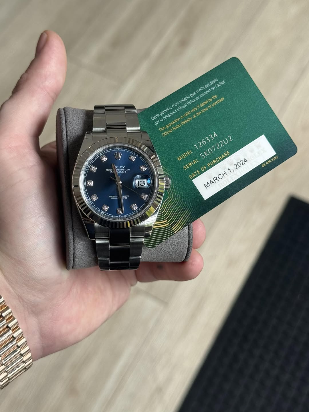 May be an image of wrist watch and text
