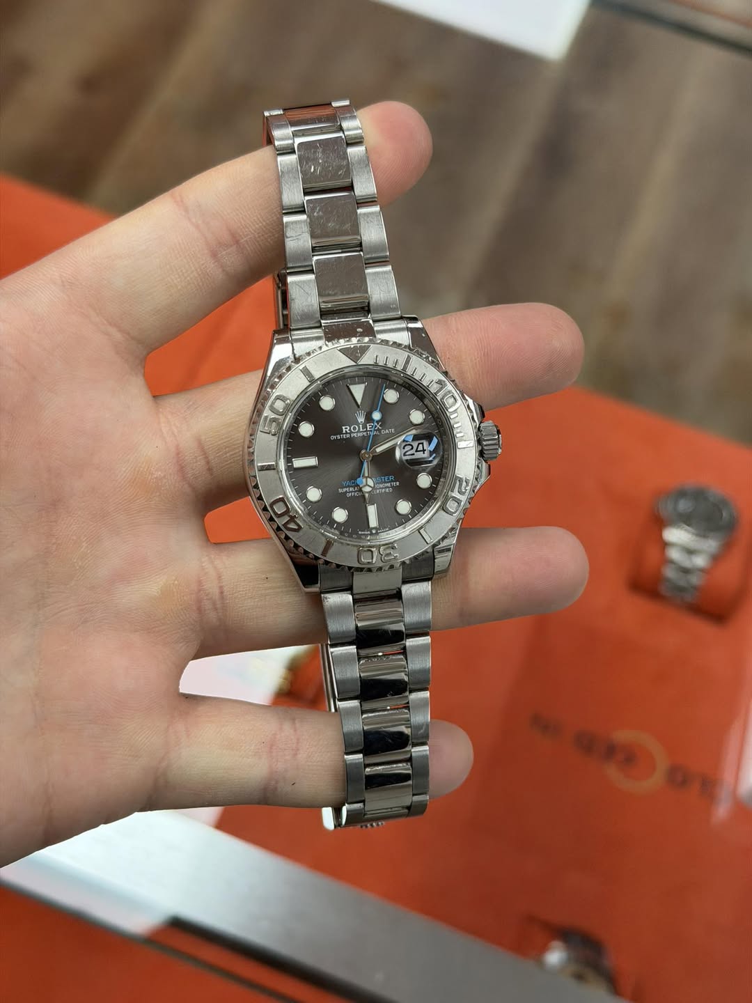 May be an image of wrist watch and text