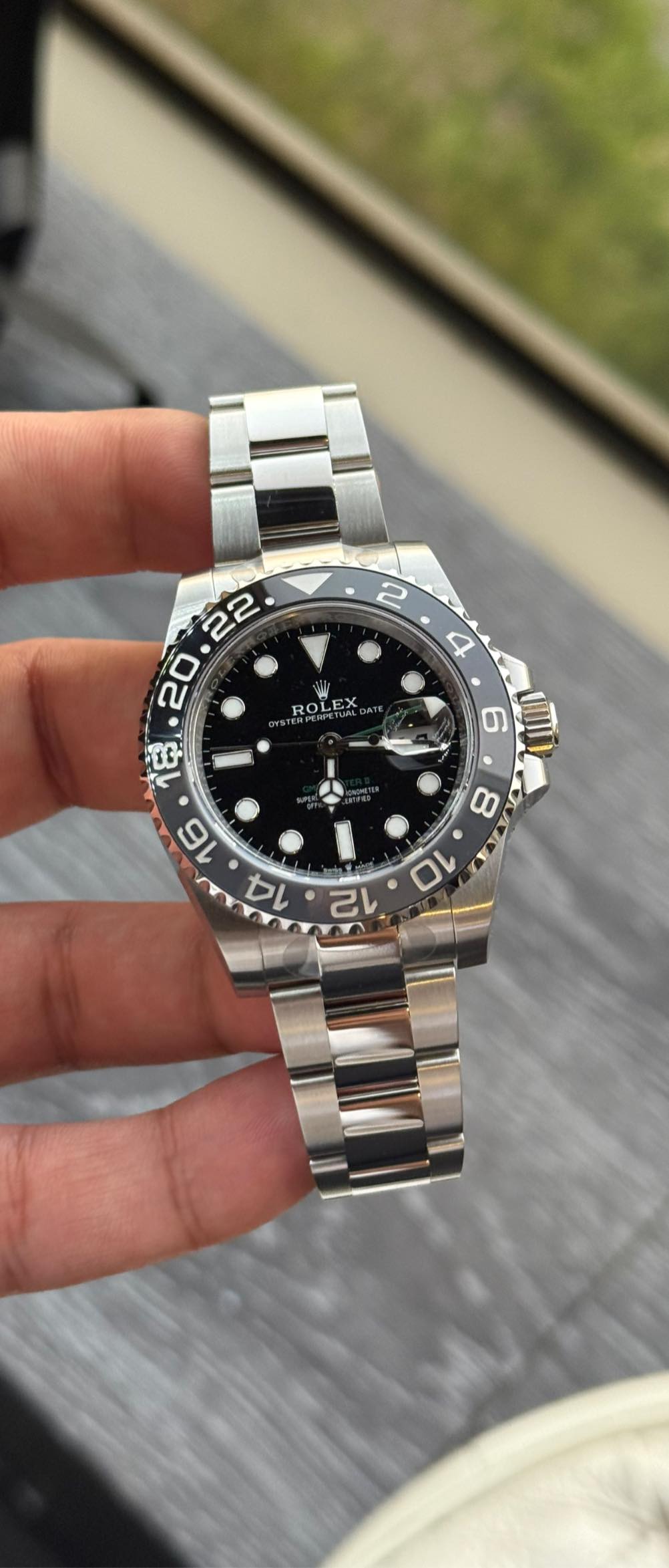 May be an image of wrist watch and text that says ' 일 ROLEX ERPEHETM ROL ដំ E 16 14 6 UUL 8 10 12'