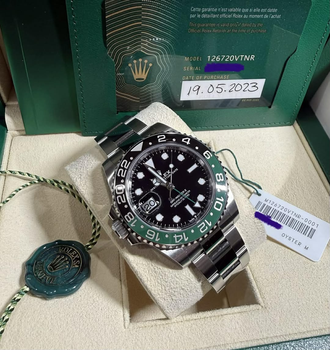 May be an image of wrist watch and text