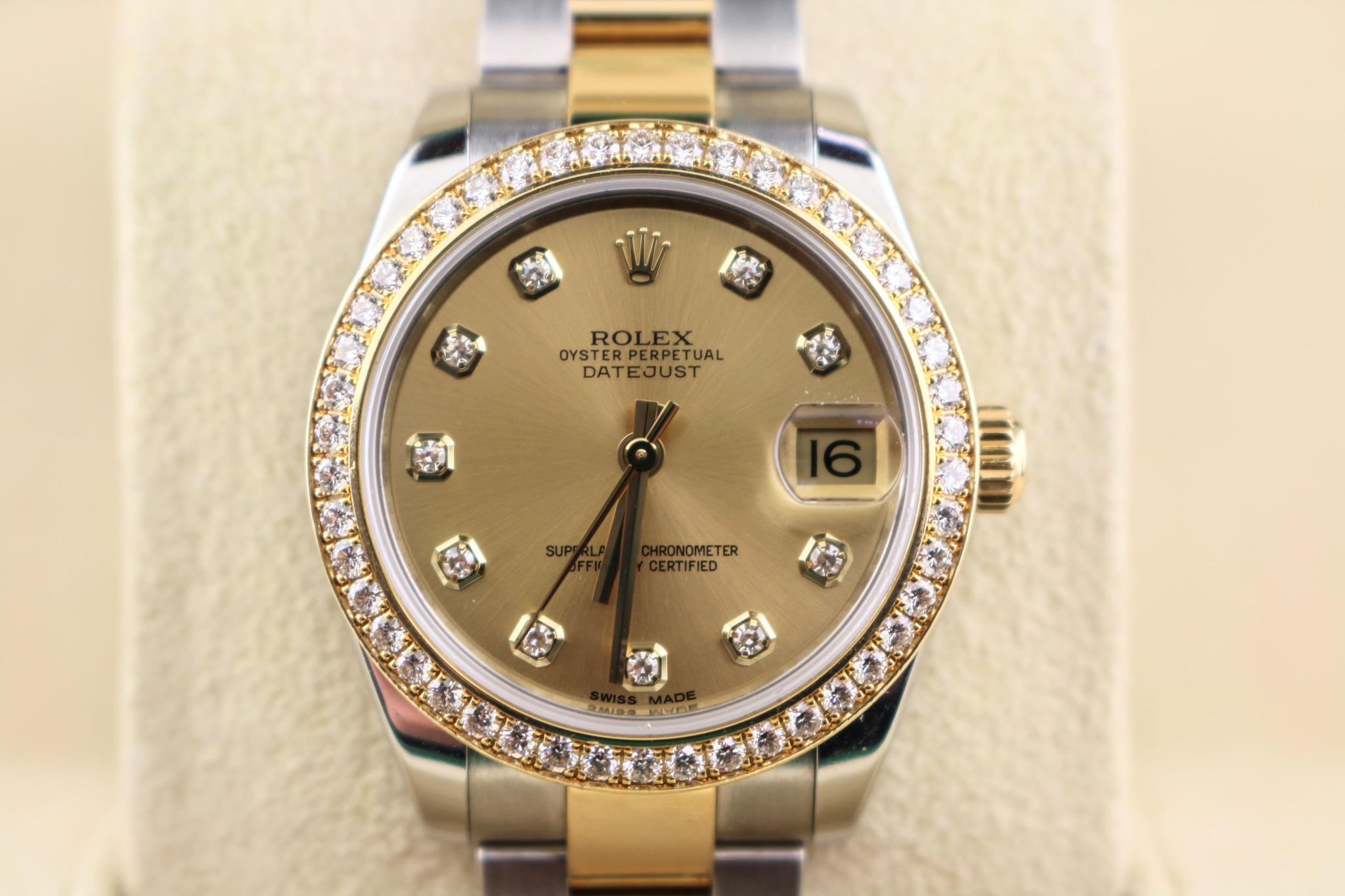 May be an image of wrist watch and text