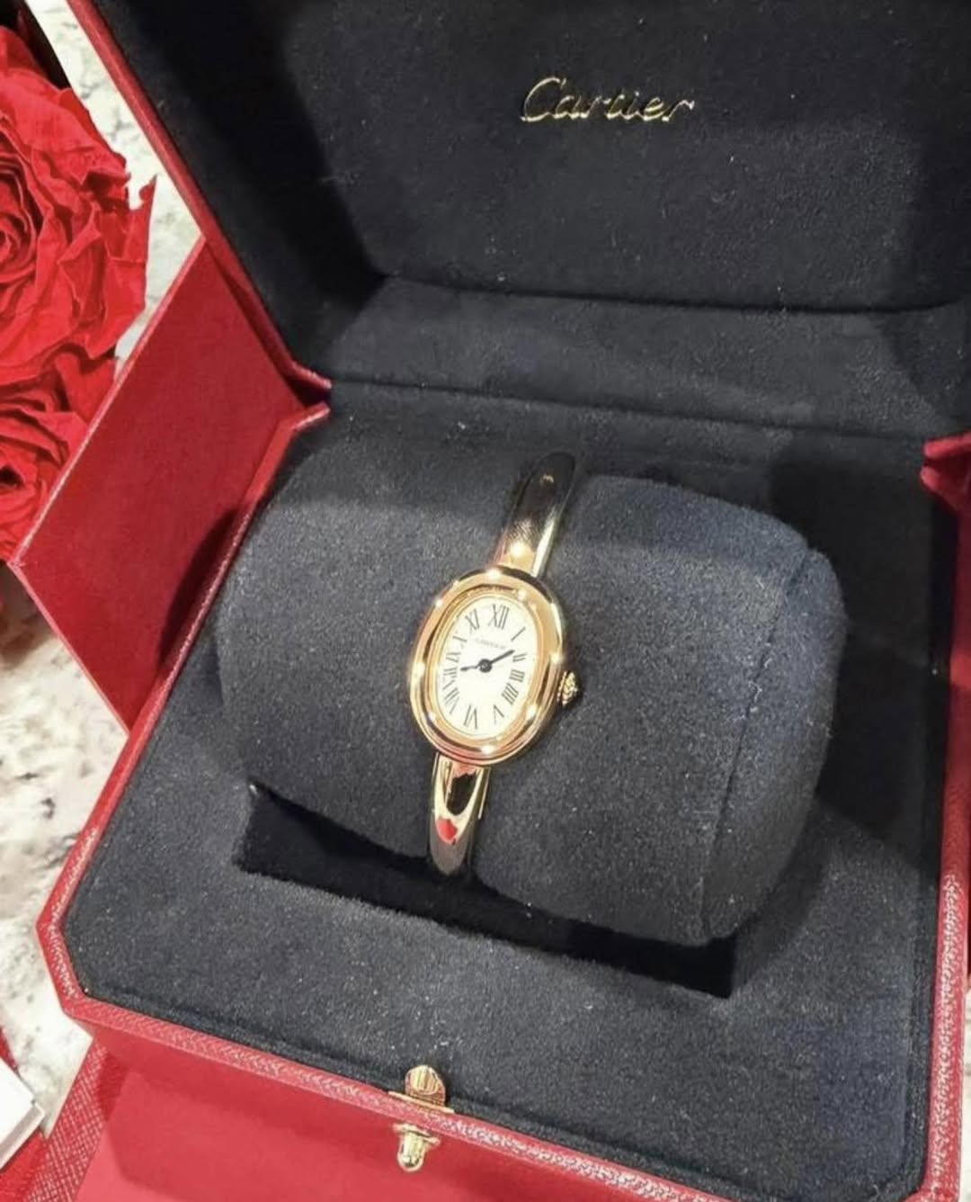 May be an image of wrist watch and text