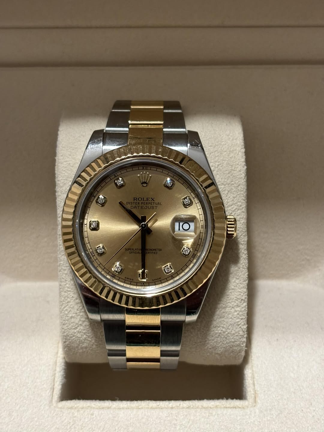 May be an image of wrist watch and text