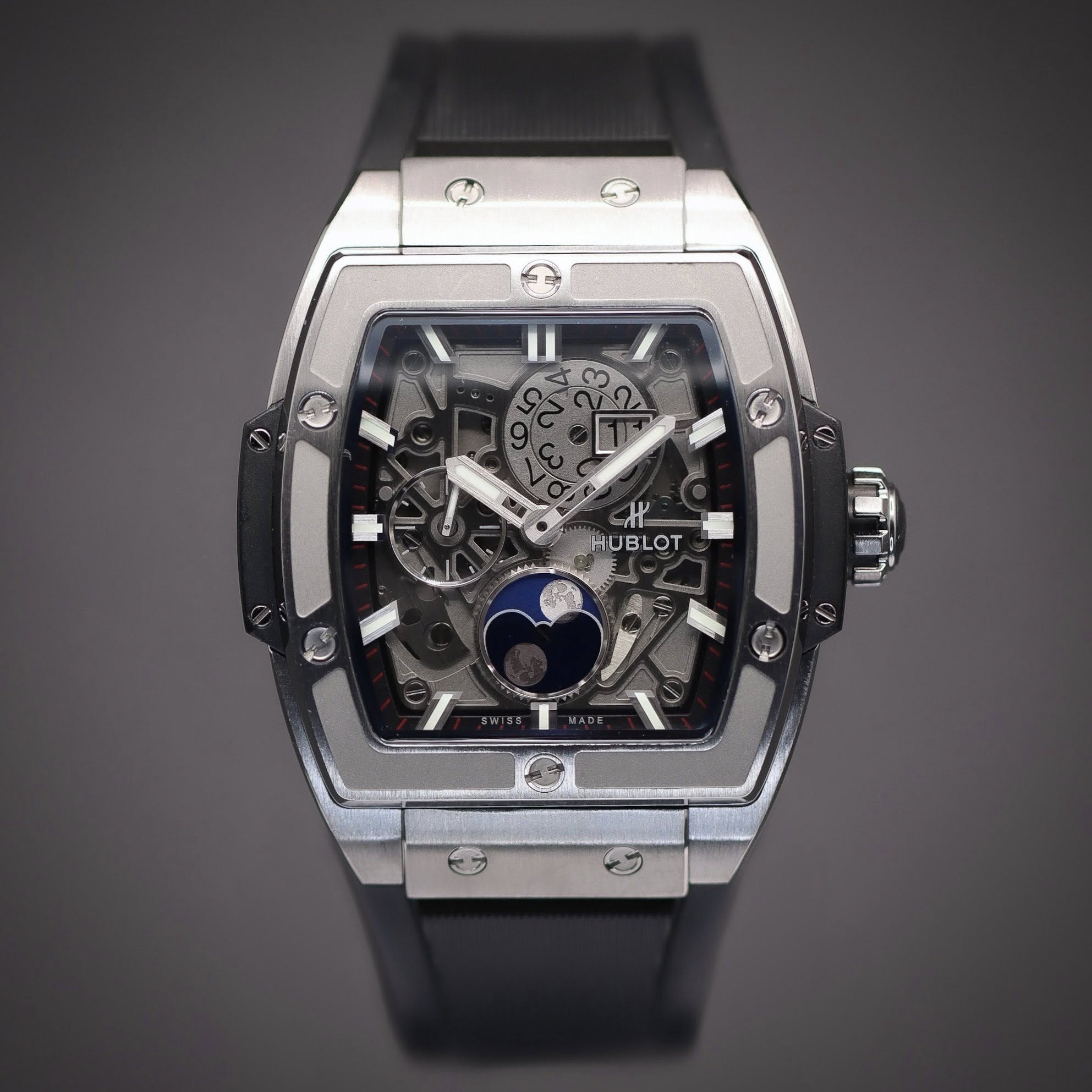 May be an image of wrist watch and text that says 'က 1 H HUBLOT'