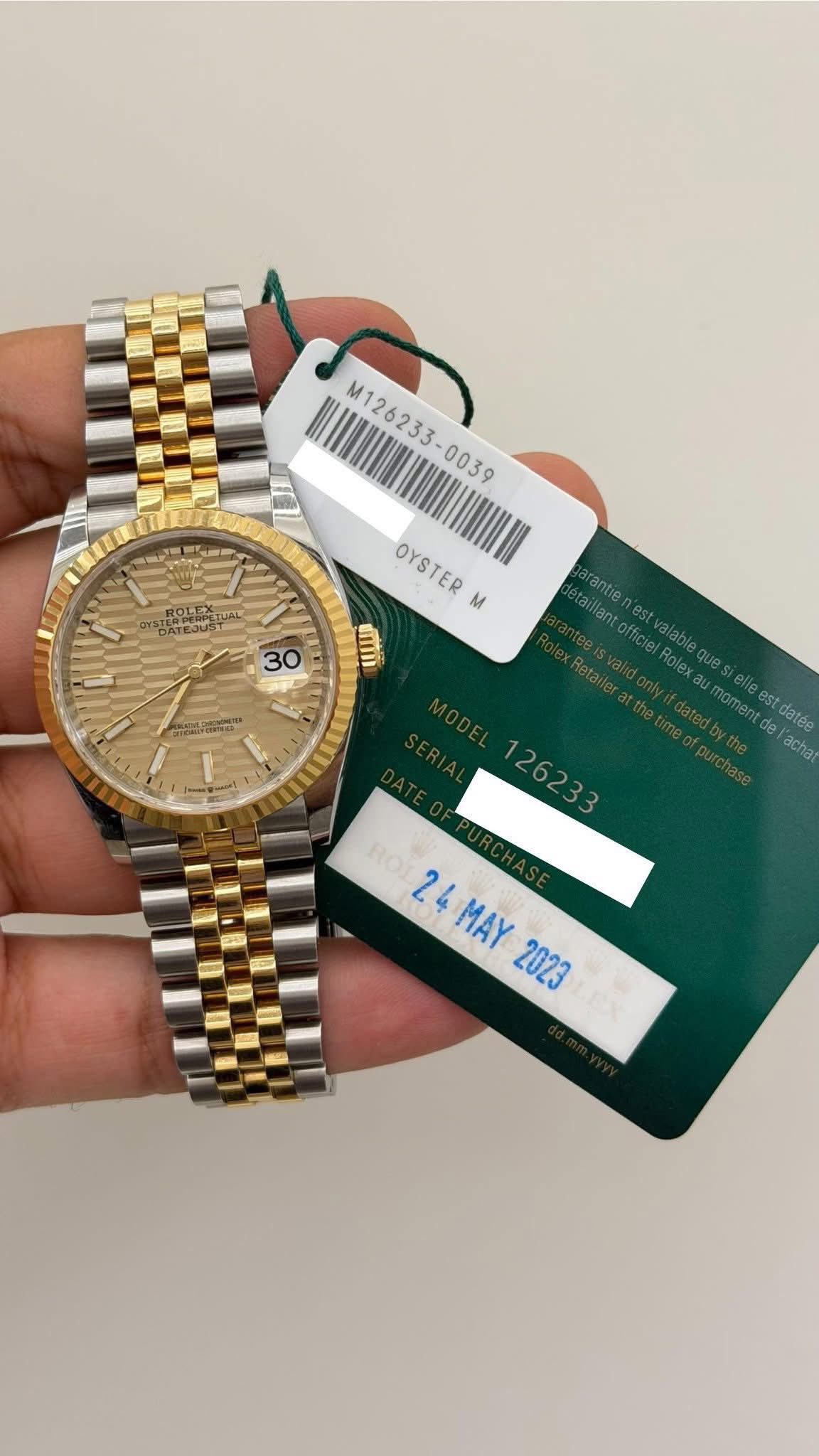May be an image of wrist watch and text that says 'M126233- M126233 TUAL တသည္ ATEJU OYSTER M umm 30 rantie.n omea m datee achat 126233 24MAY 24 MAY 2023'