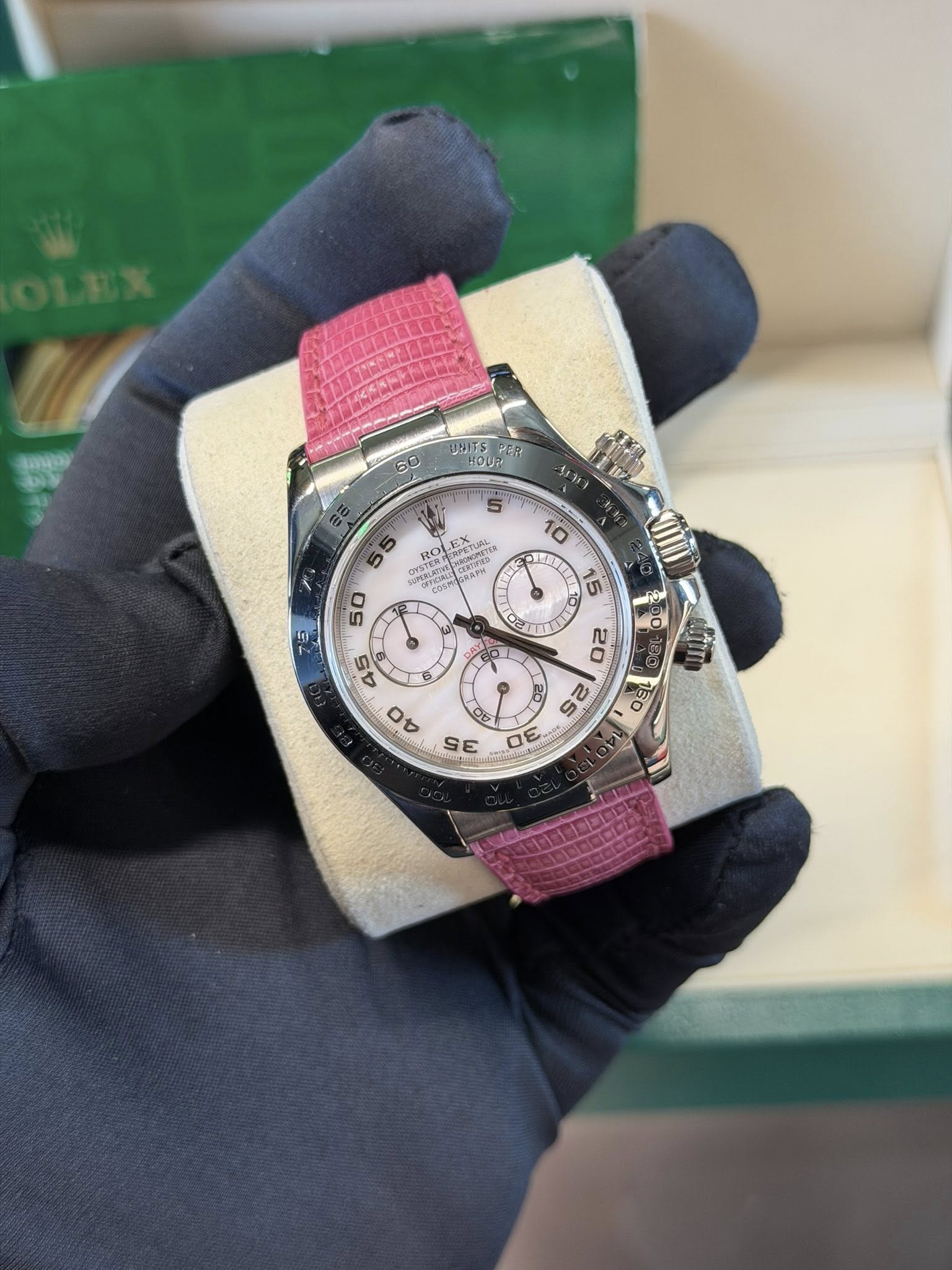 May be an image of wrist watch and text