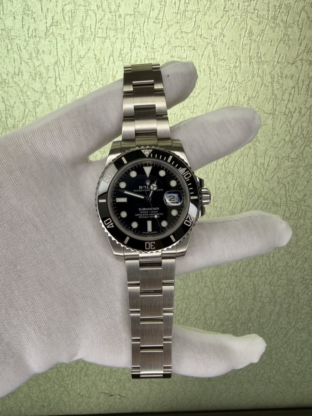 May be an image of wrist watch and text