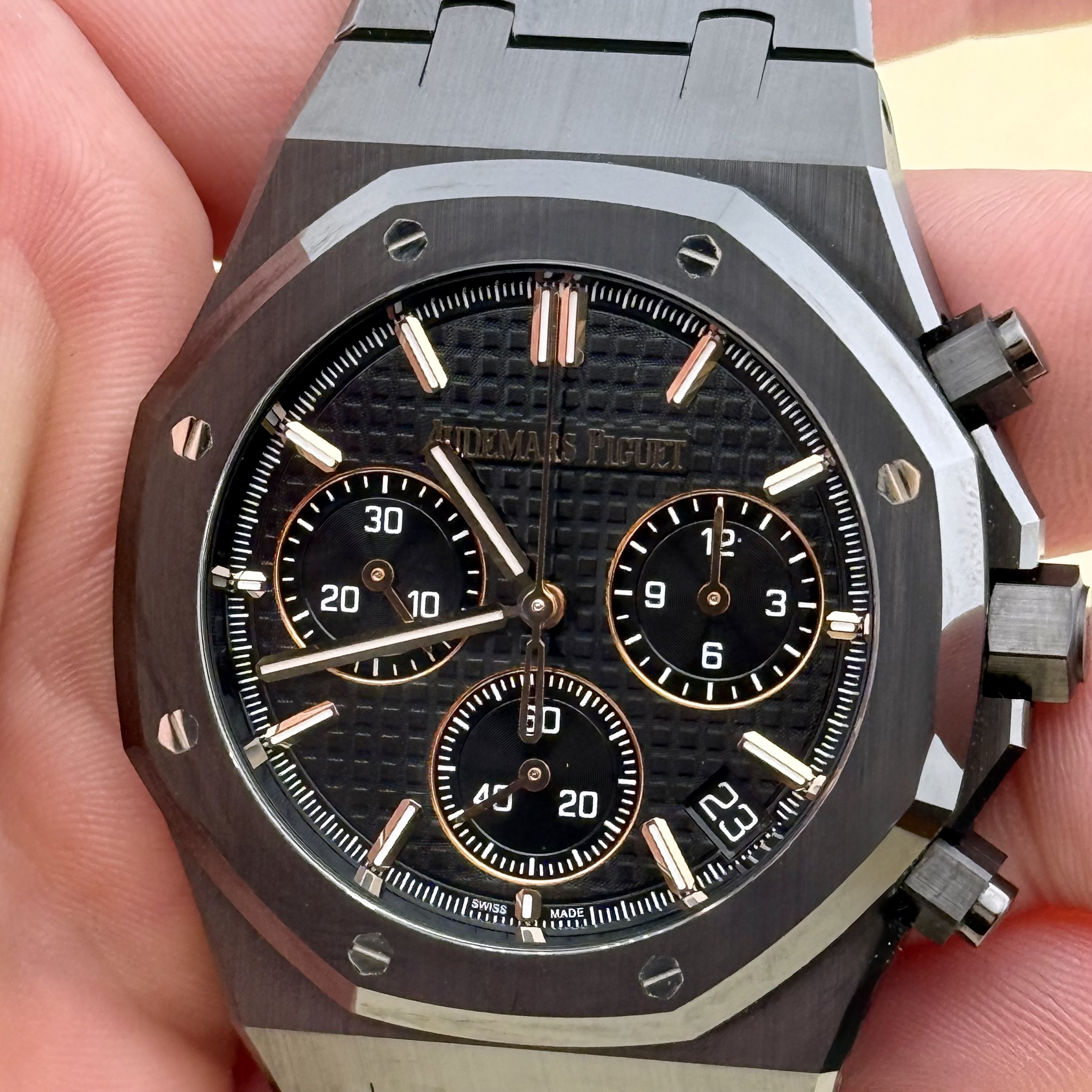 May be an image of wrist watch and text