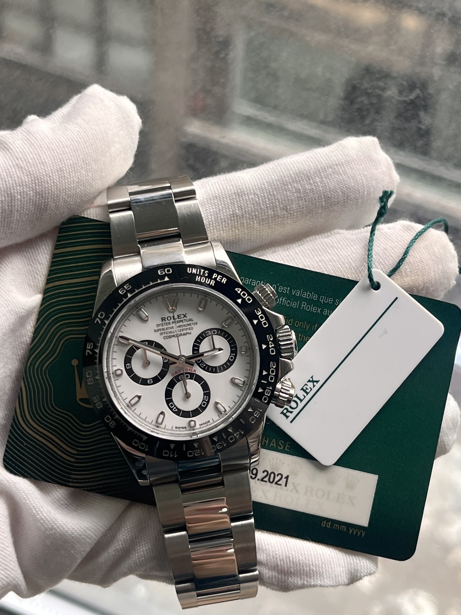 May be an image of wrist watch and text
